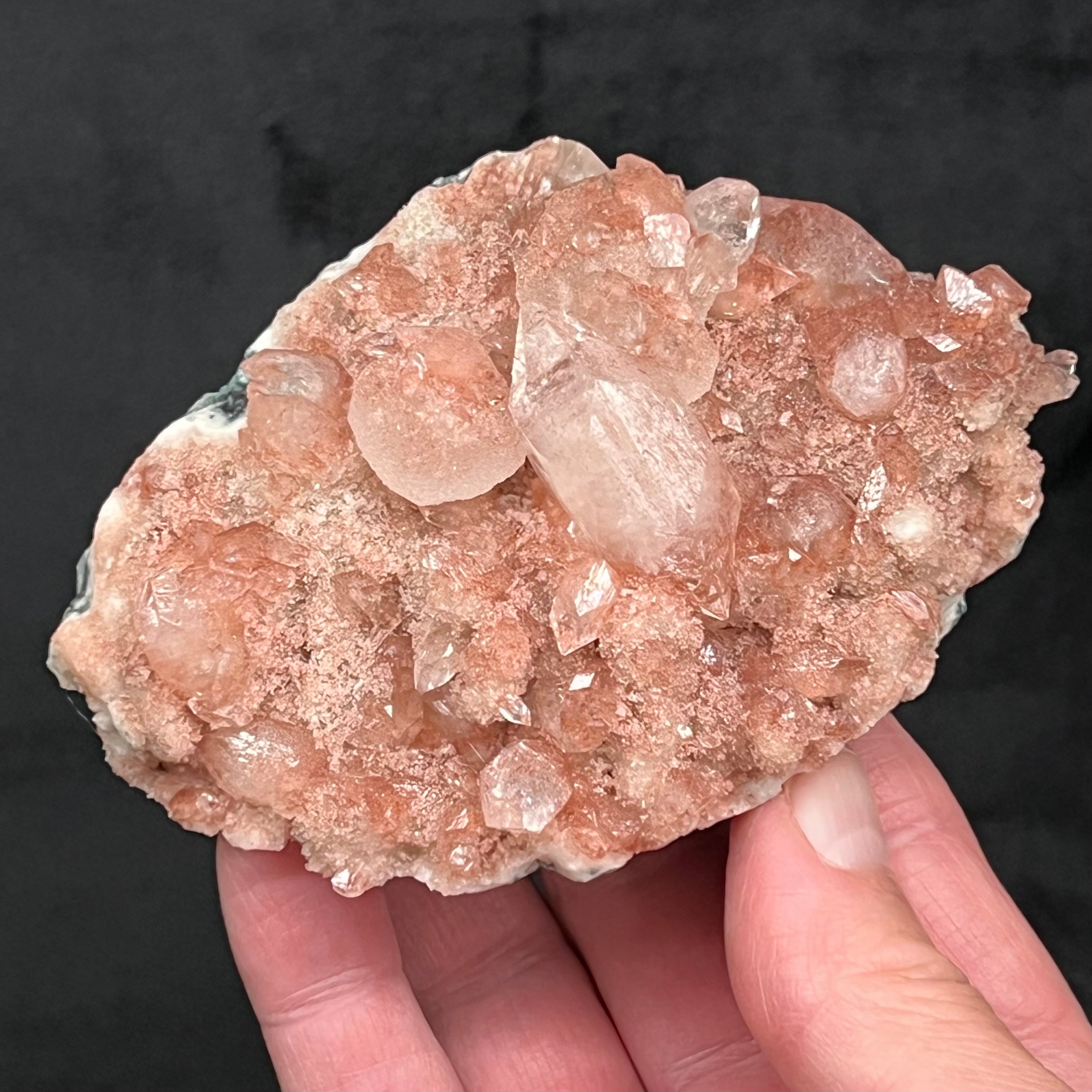 This is excellent Apophyllite, exhibiting many double terminated crystals, with flattened rhombohedral sugary appearing Calcite, growing on Quartz druse on a basalt matrix. Source: Jalgaon District, Nashik Division, Maharashtra, western India.