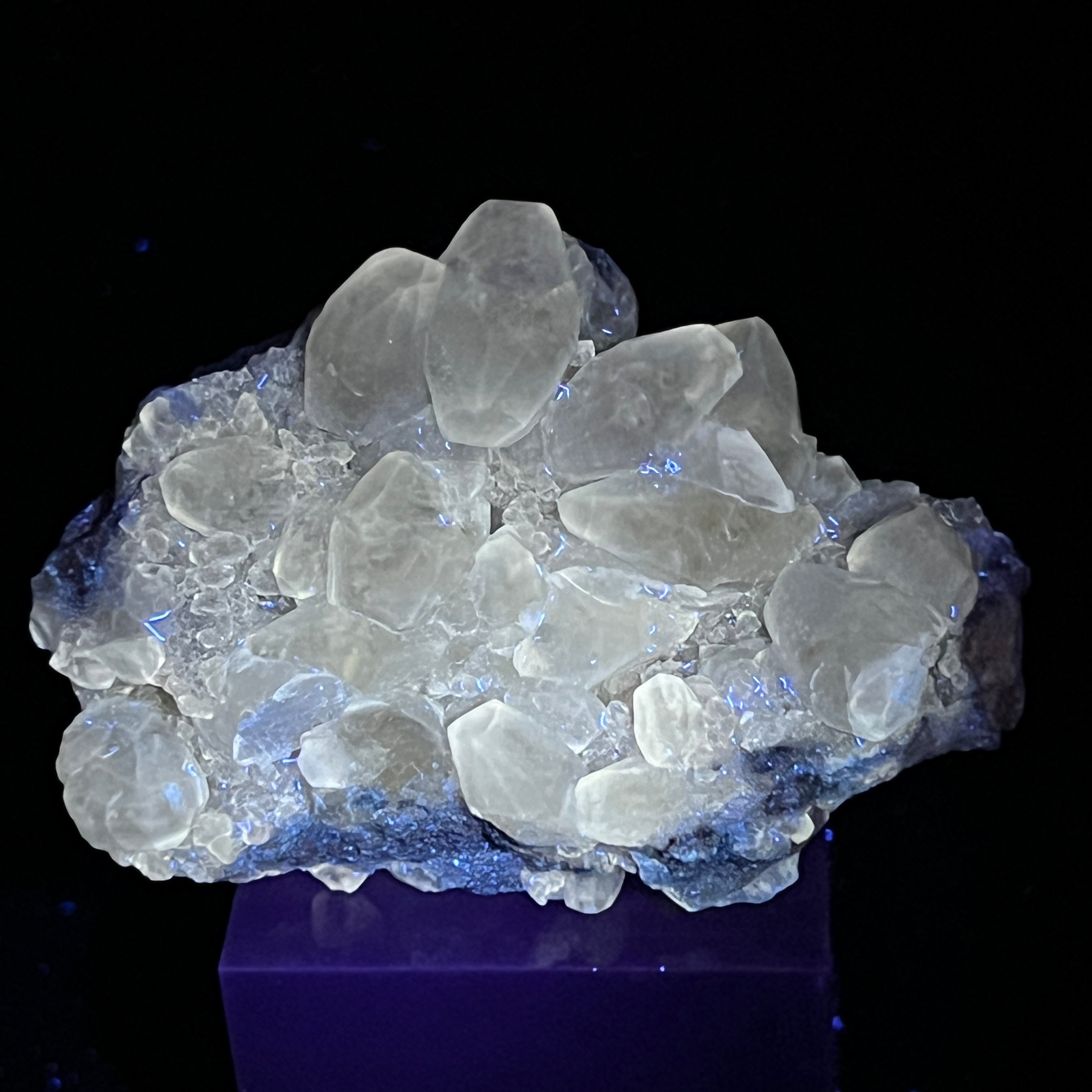 A soft and pleasing fluorescence is evident when this Calcite is exposed to UV light.