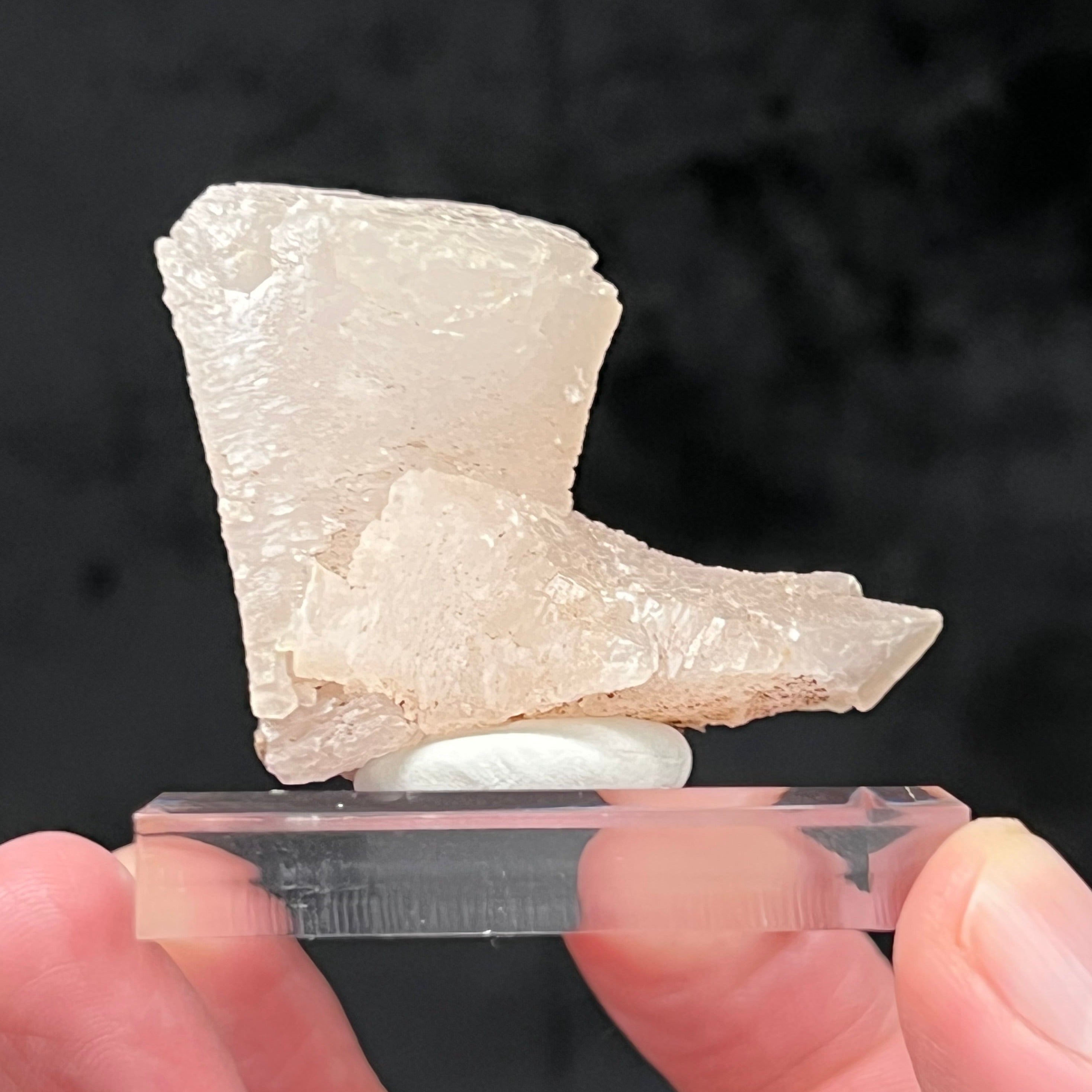 This is fascinating, unusual growth rhombohedral Calcite exhibiting a sloping, flared looking presentation, wider at the faces and termination while narrower near the base with atypically structured crystals at a 90 degree angle for an overall intriguing boot shaped specimen.