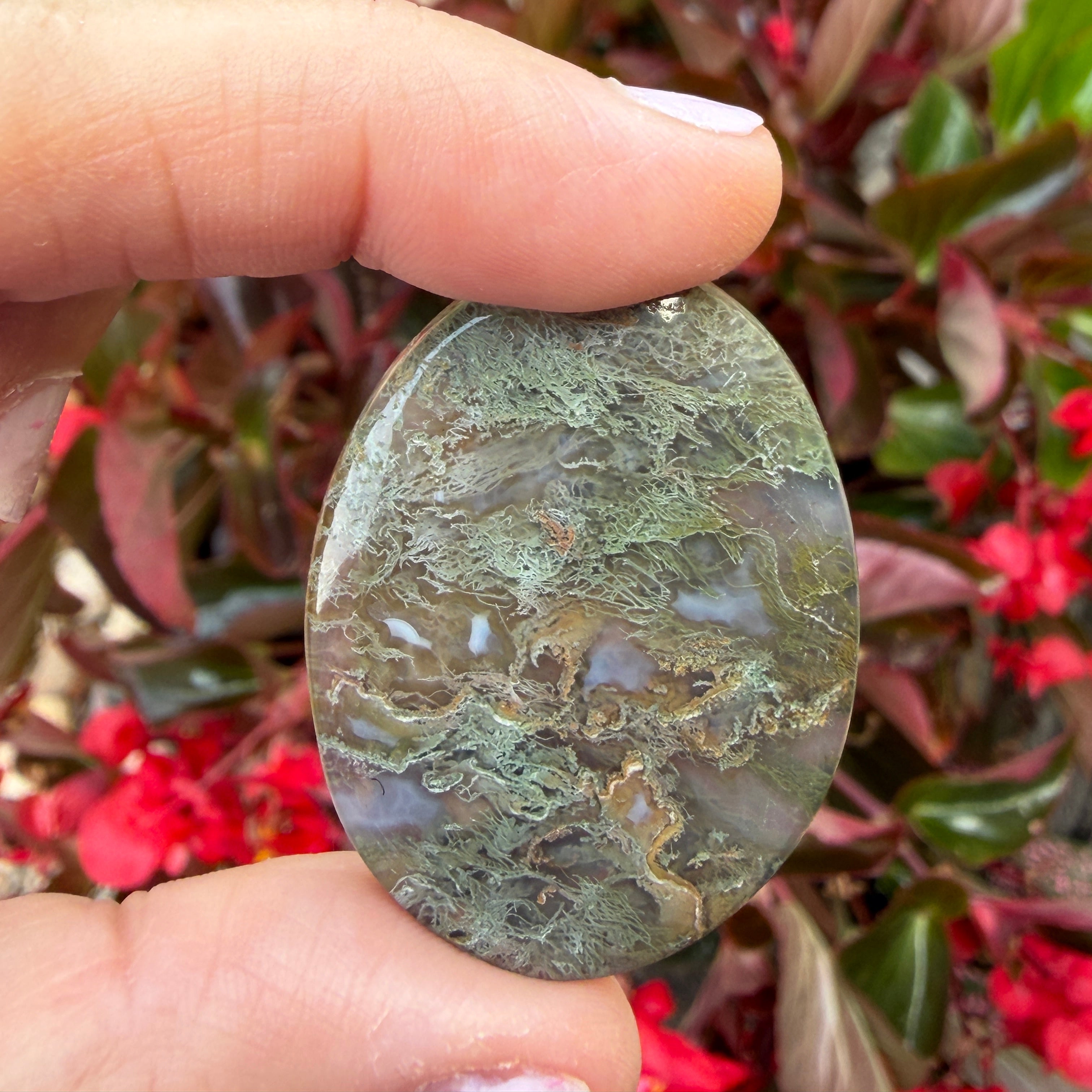 Green Moss Agate shown outside