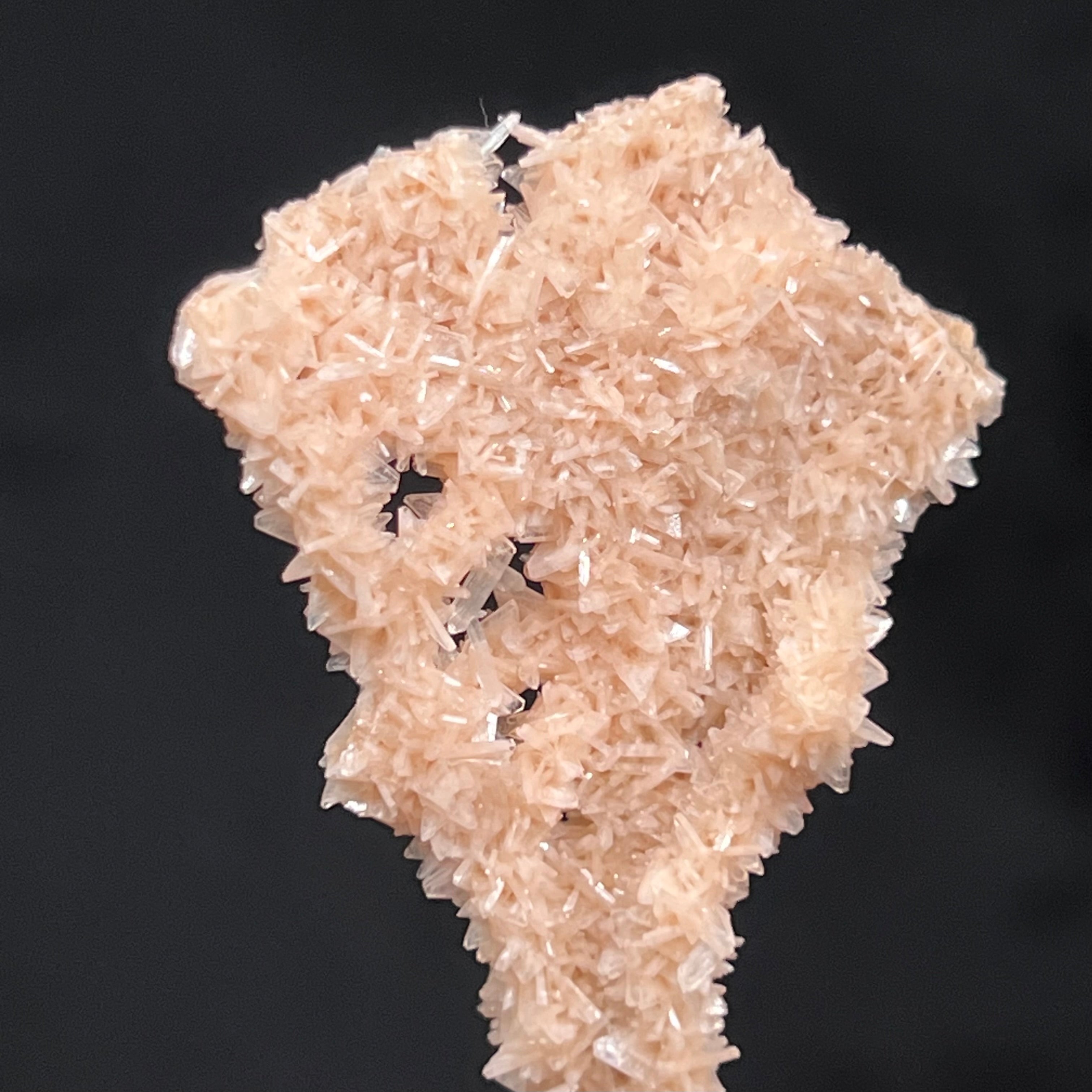 The combination of the well formed rhombic, wedge shaped Heulandite and slender, tabular Stilbite is beautiful, add to that a truly rare stalactite form, and you have an absolutely wonderous specimen!