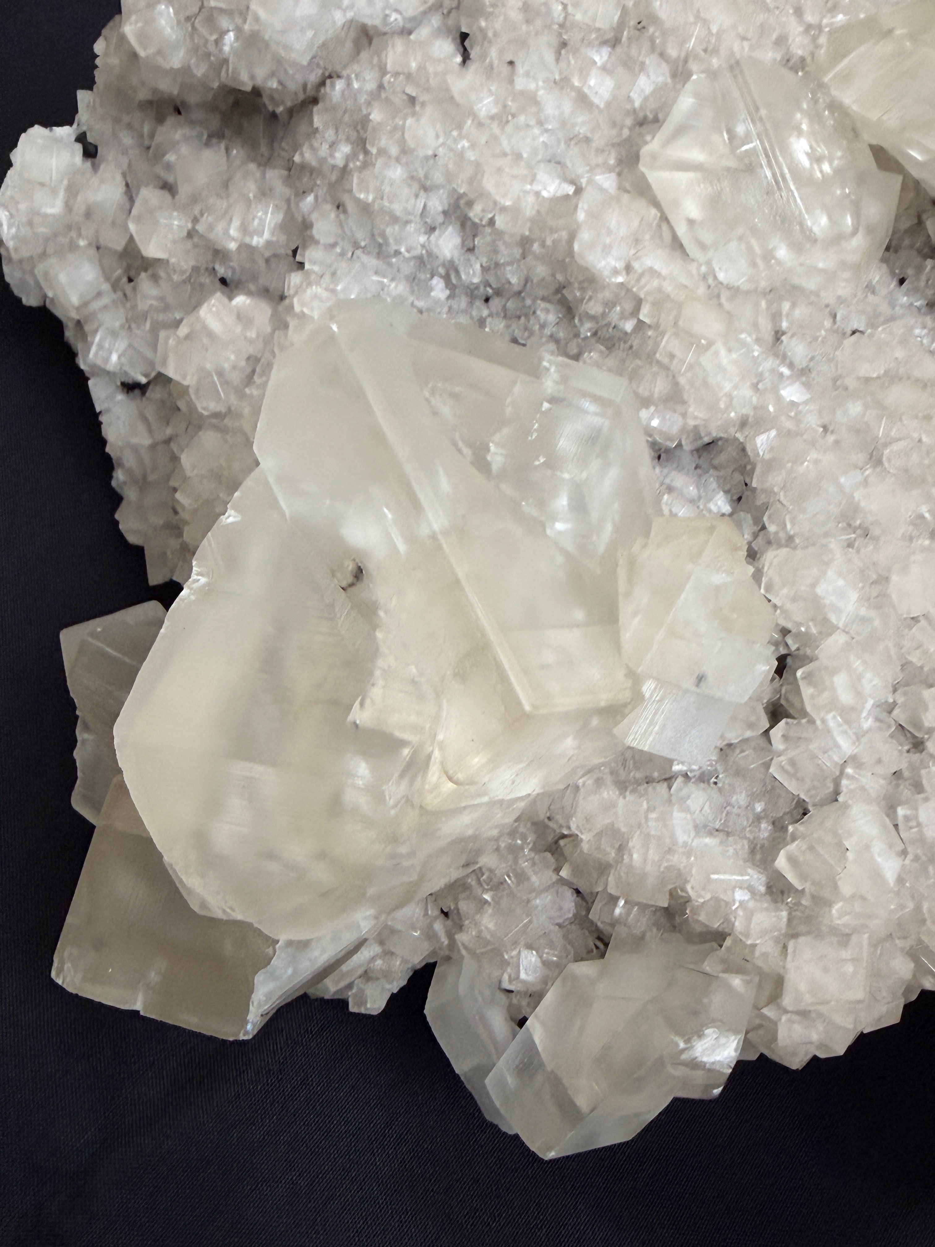 Close-up of crystal formations on a dark background