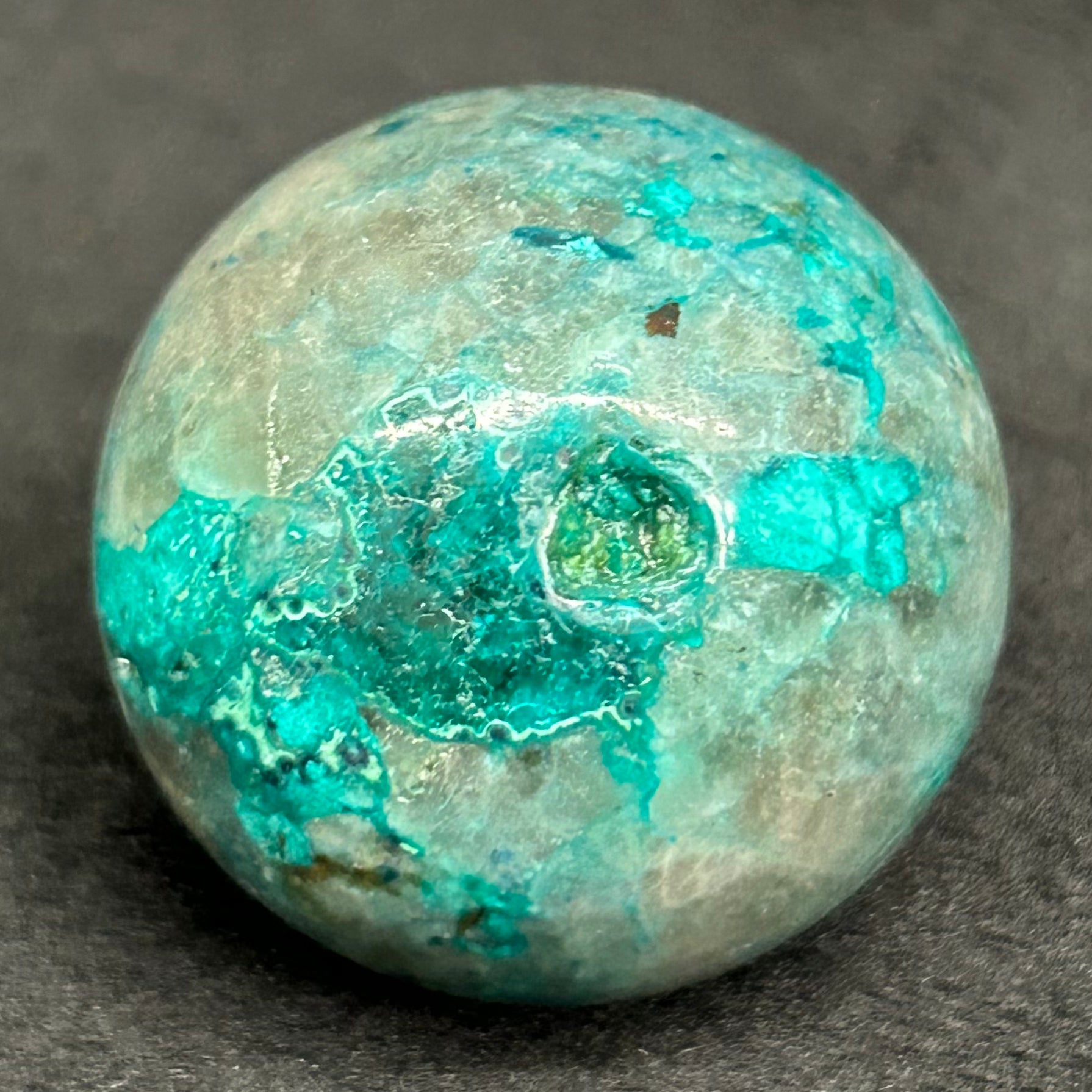 This sphere has a natural formed dimple.