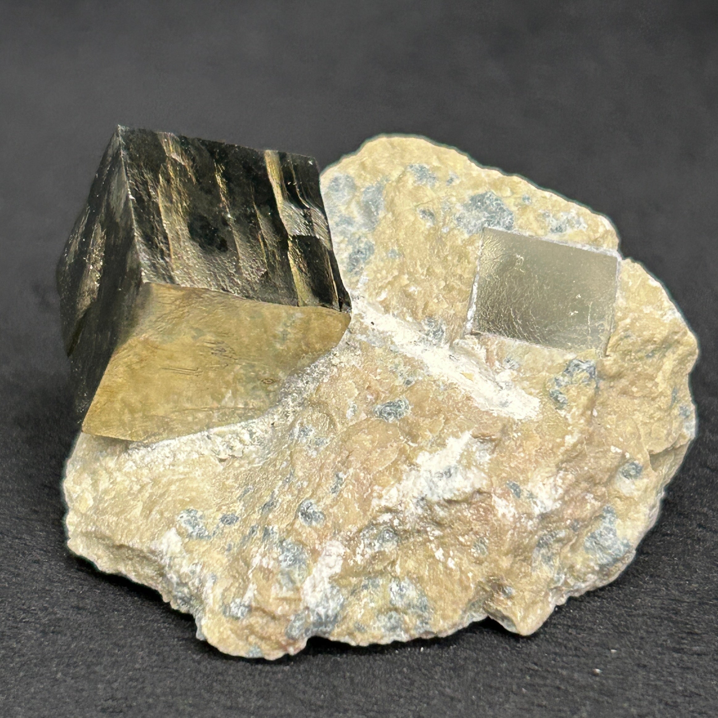 Pyrite is a beautiful iron sulfide (disulfide) mineral found in many geological formations from sedimentary deposits to hydrothermal veins and as part of metamorphic rocks. Named in antiquity from the Greek "pyr" for "fire", because sparks flew from it when struck with another mineral or metal.