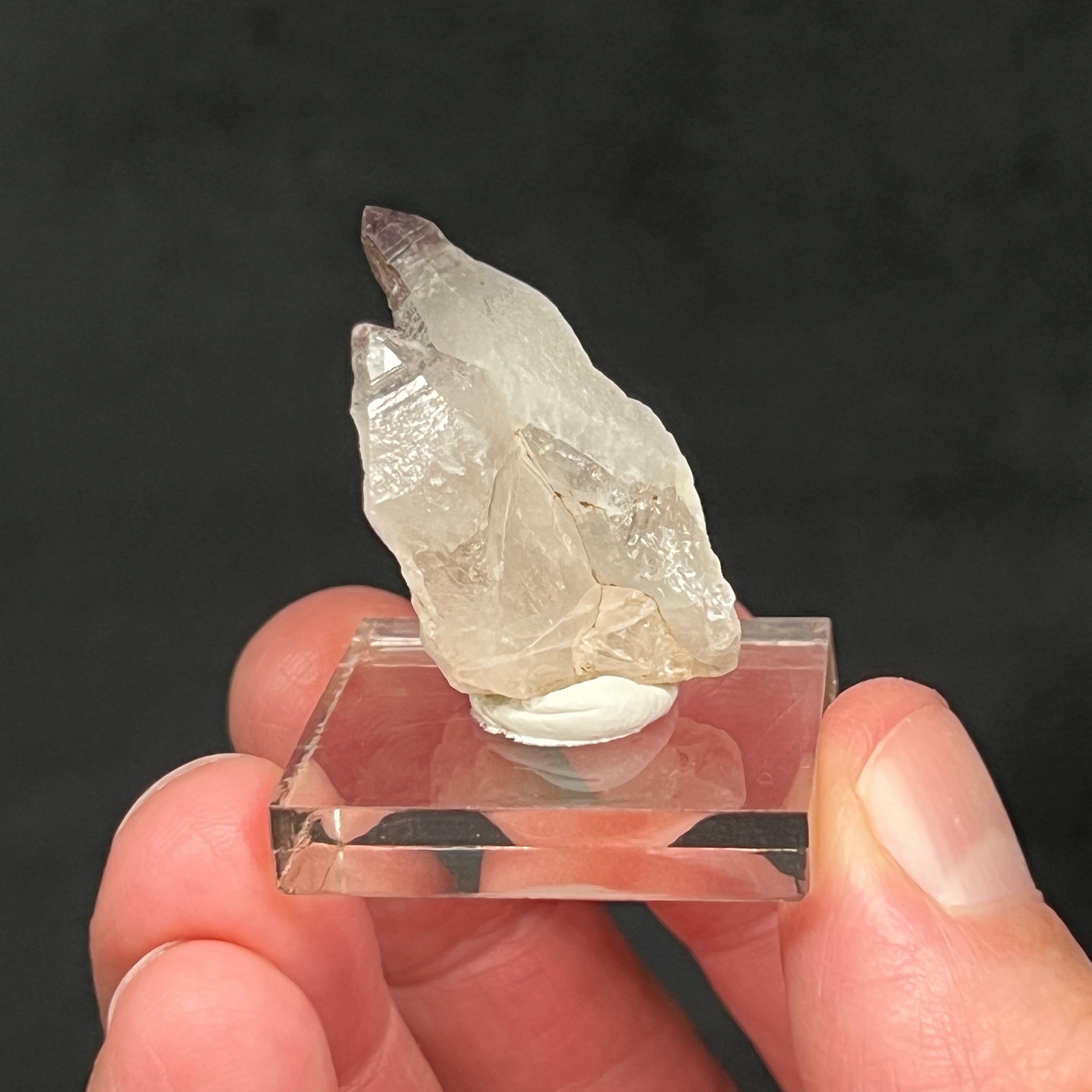 11 grams. 1.21" x .91" x .76" or 30.9mm x 23.3mm x 19.3mm
