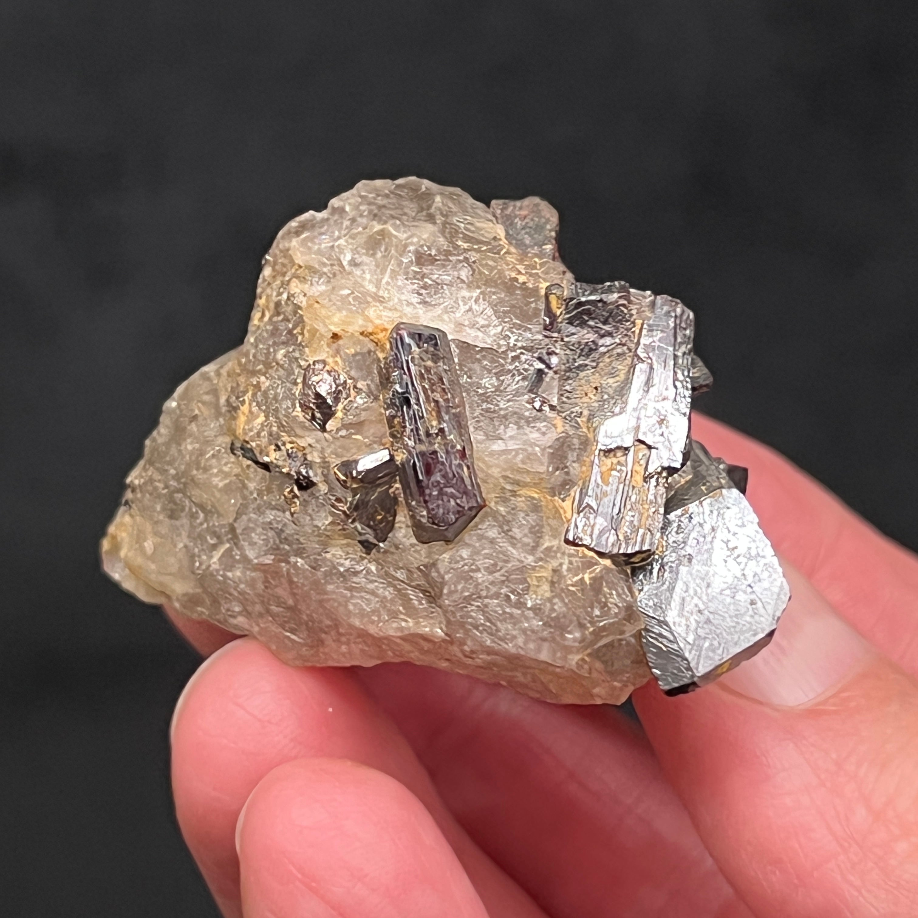 This photo shows another perspective in which to see the double-terminated rutile and the luster on this excellent piece from North Carolina.