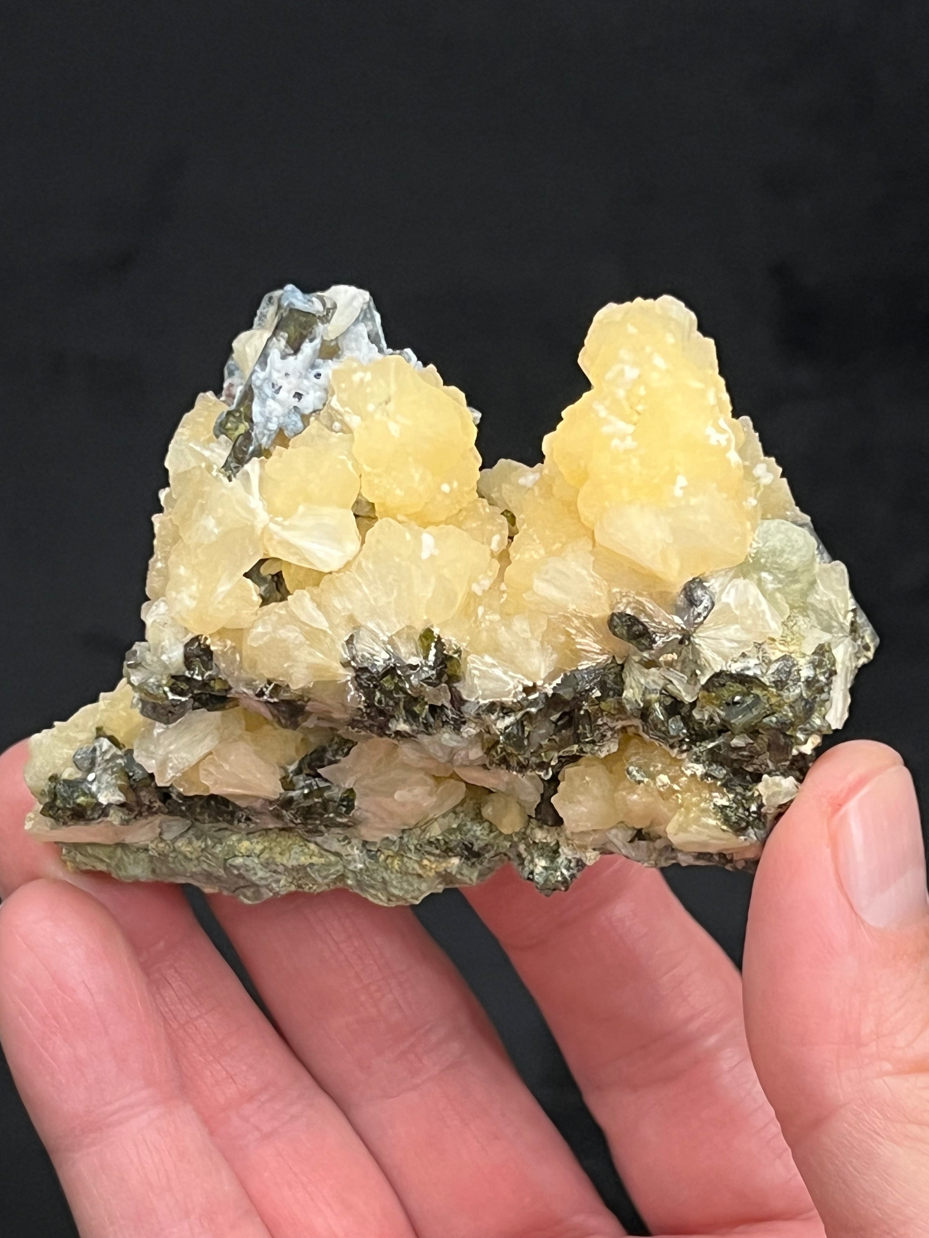 Looking to complete a Stilbite "type" collection? This is an interesting, less common association of yellow Stilbite with Epidote, a departure from the more prolific Prehnite and Epidote combination seen more frequently from Mali.