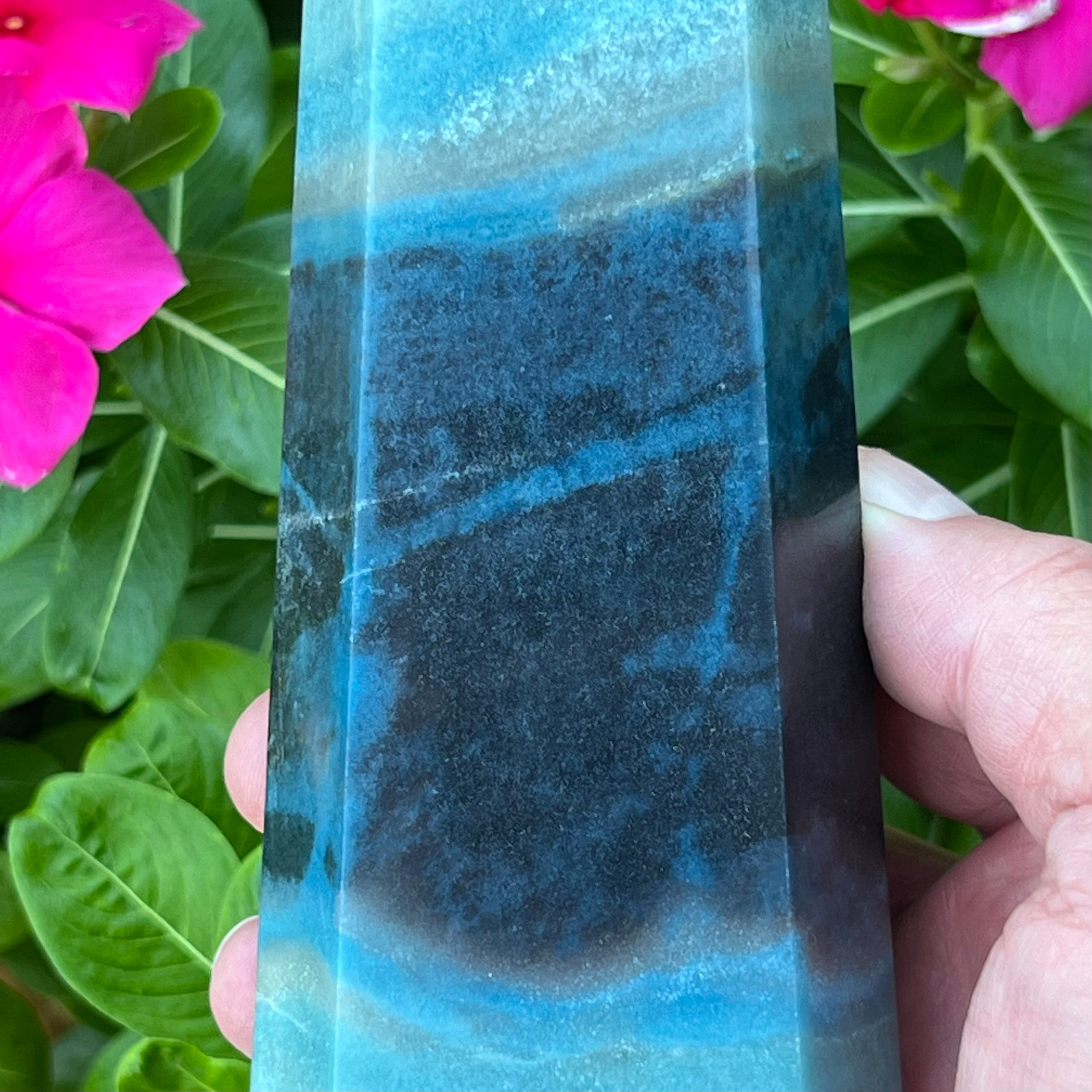 Trolleite is an exceptionally attractive stone presenting with many shades of blue, cream, and ivory hues reminiscent of a gaze into the far reaches of space or the welcoming shoreline patterns caused by ocean waves, sea foam and sandy beach, some may have complimenting light grey colors included.