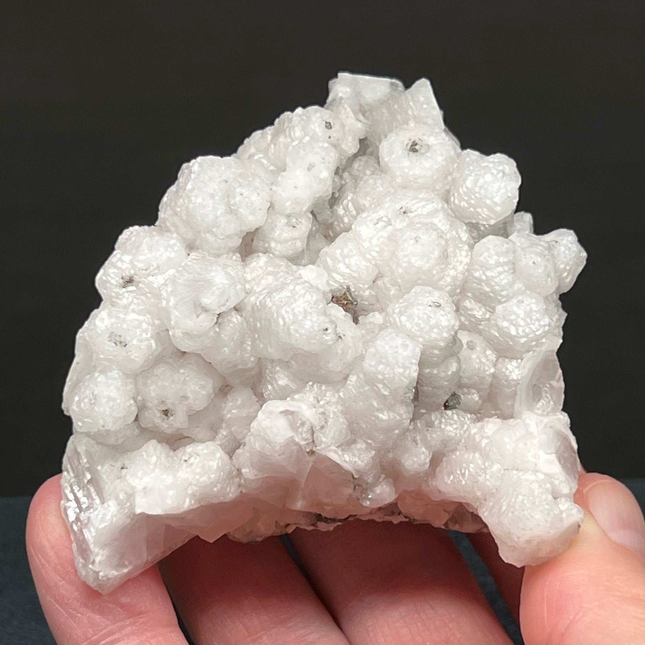 This is a truly fascinating, unusual specimen of lustrous, bright white Columnar Poker Chip Calcite from Morocco.