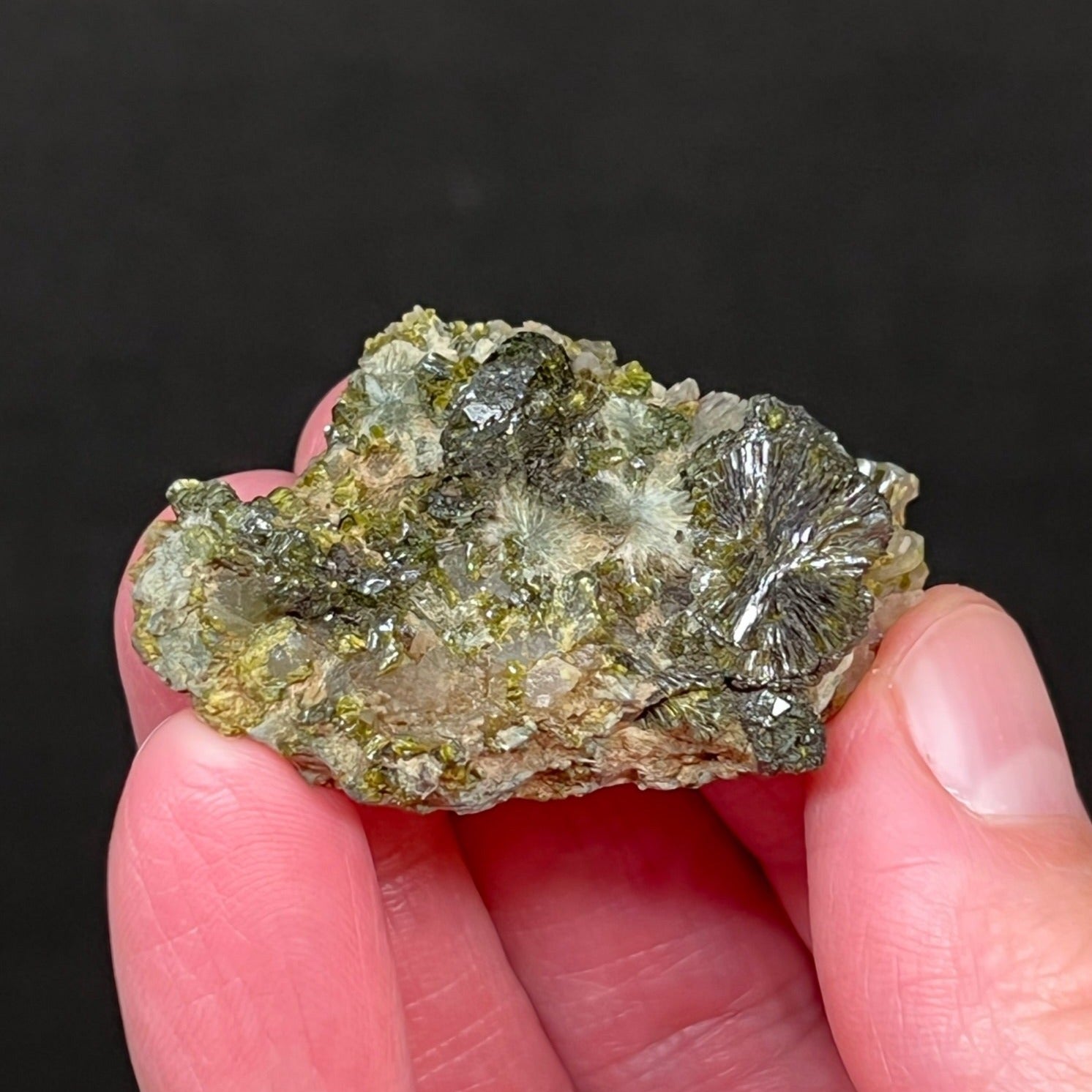 This is a sensational, quality Epidote specimen presenting dark green, lustrous group of well formed, prismatic, fan and bowtie shaped crystals intermingling with quartz crystals.