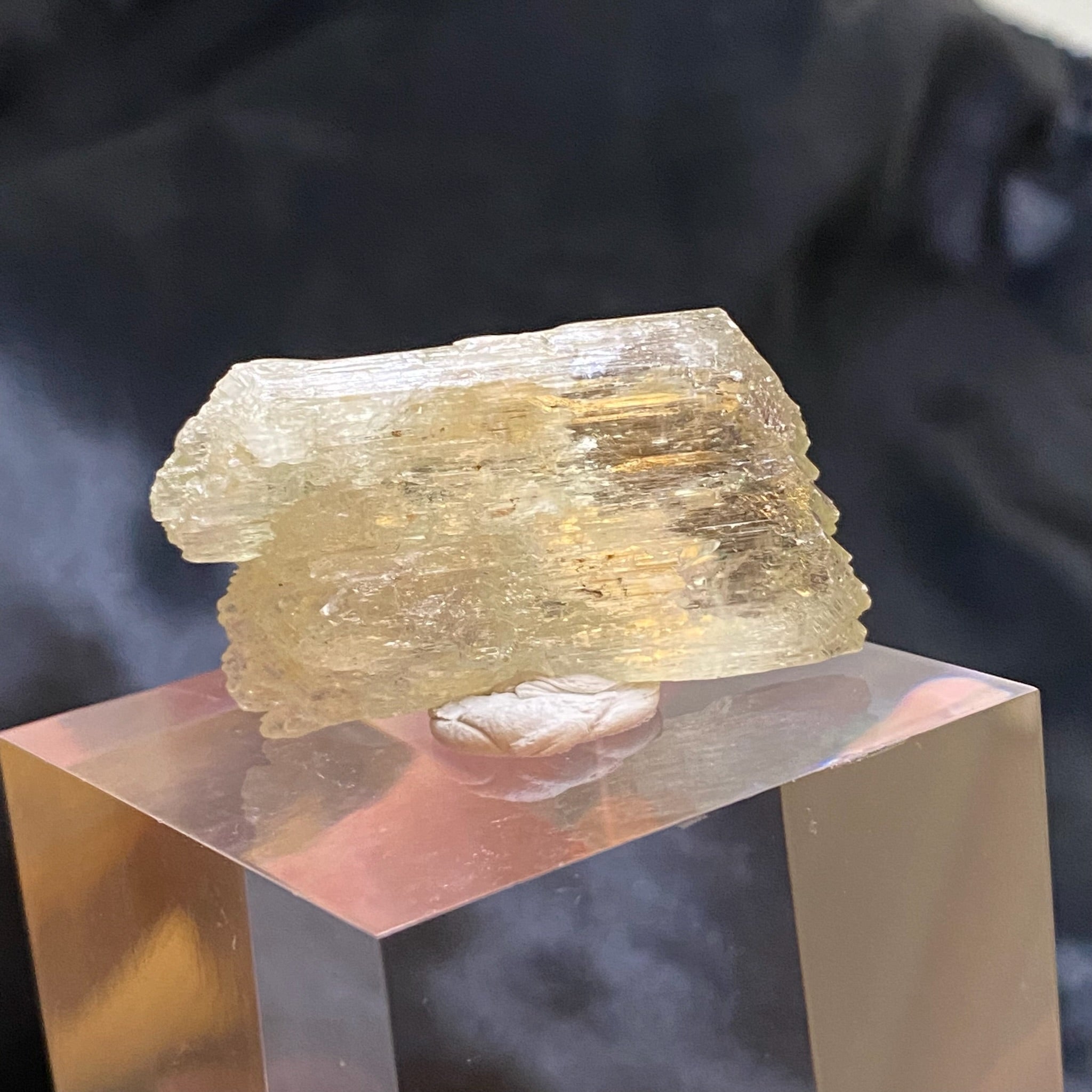 This Spodumene var. Kunzite / Hiddenite crystal is a higher quality example with natural etching, hence its interesting texture and surface features.
