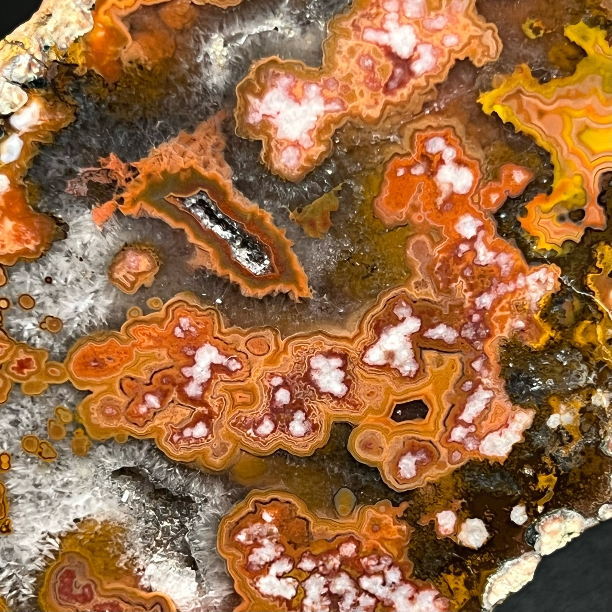 Another fascinating attribute of this excellent example of a Moroccan Agate is the translucency and transparency, i.e. the clear areas of the specimen that give the appearance that many of the beautiful structures, including botryoidal structures, are floating and immersed within the agate.