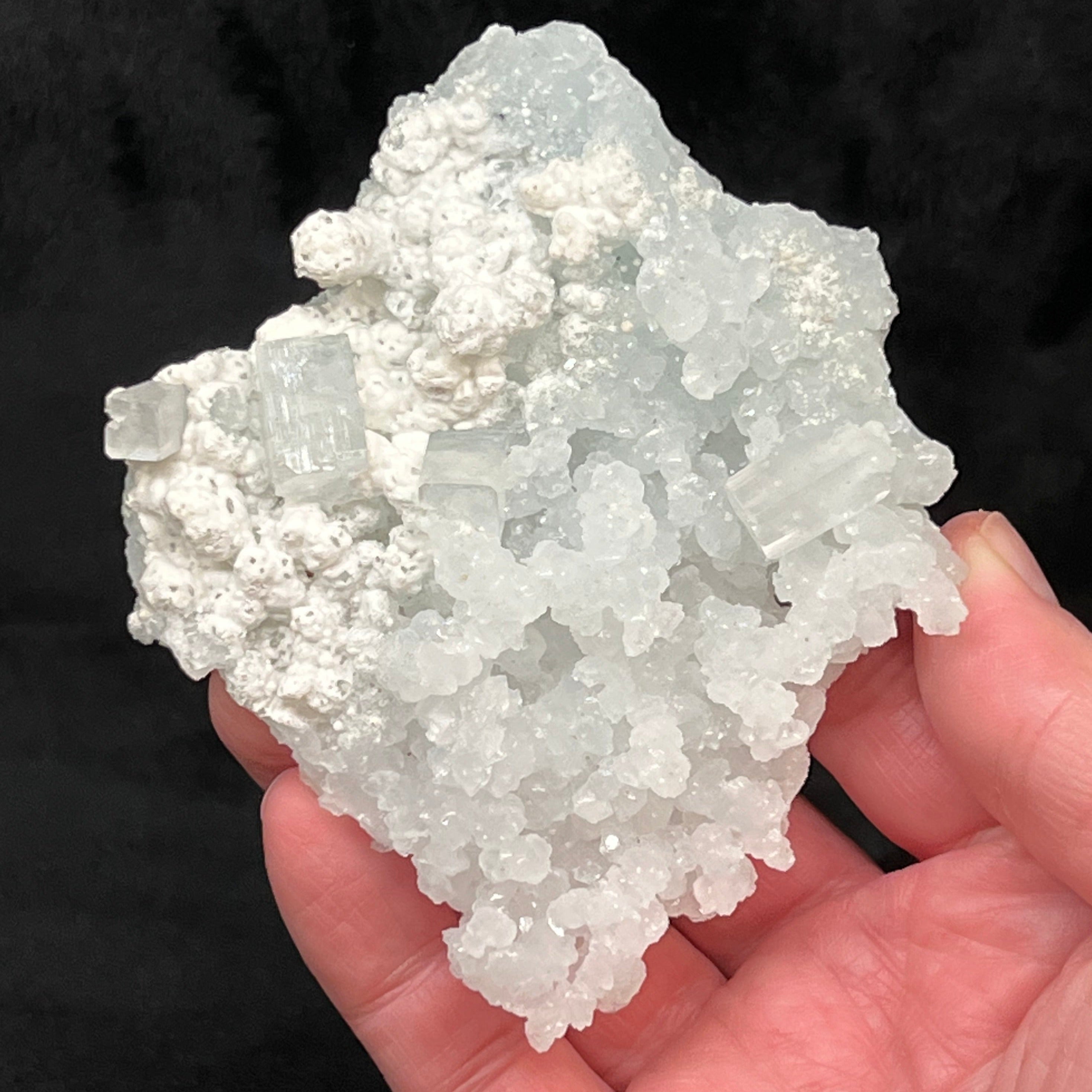 This beautiful Prehnite pseudomorph after Laumontite specimen is a excellent example of Prehnite that replaced prismatic crystals that were once Laumontite.