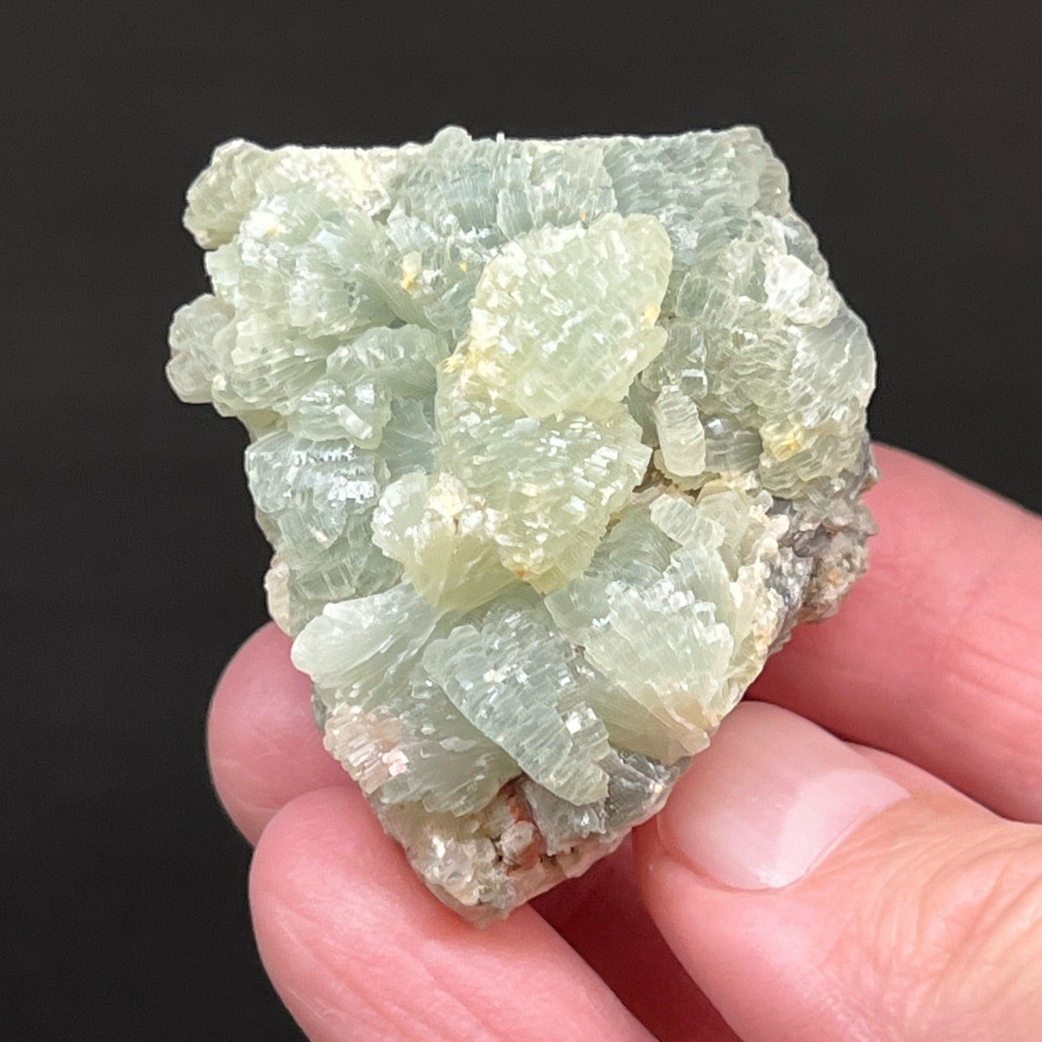 A calcium aluminum silicate, Prehnite usually presents in yellow and light green hues.