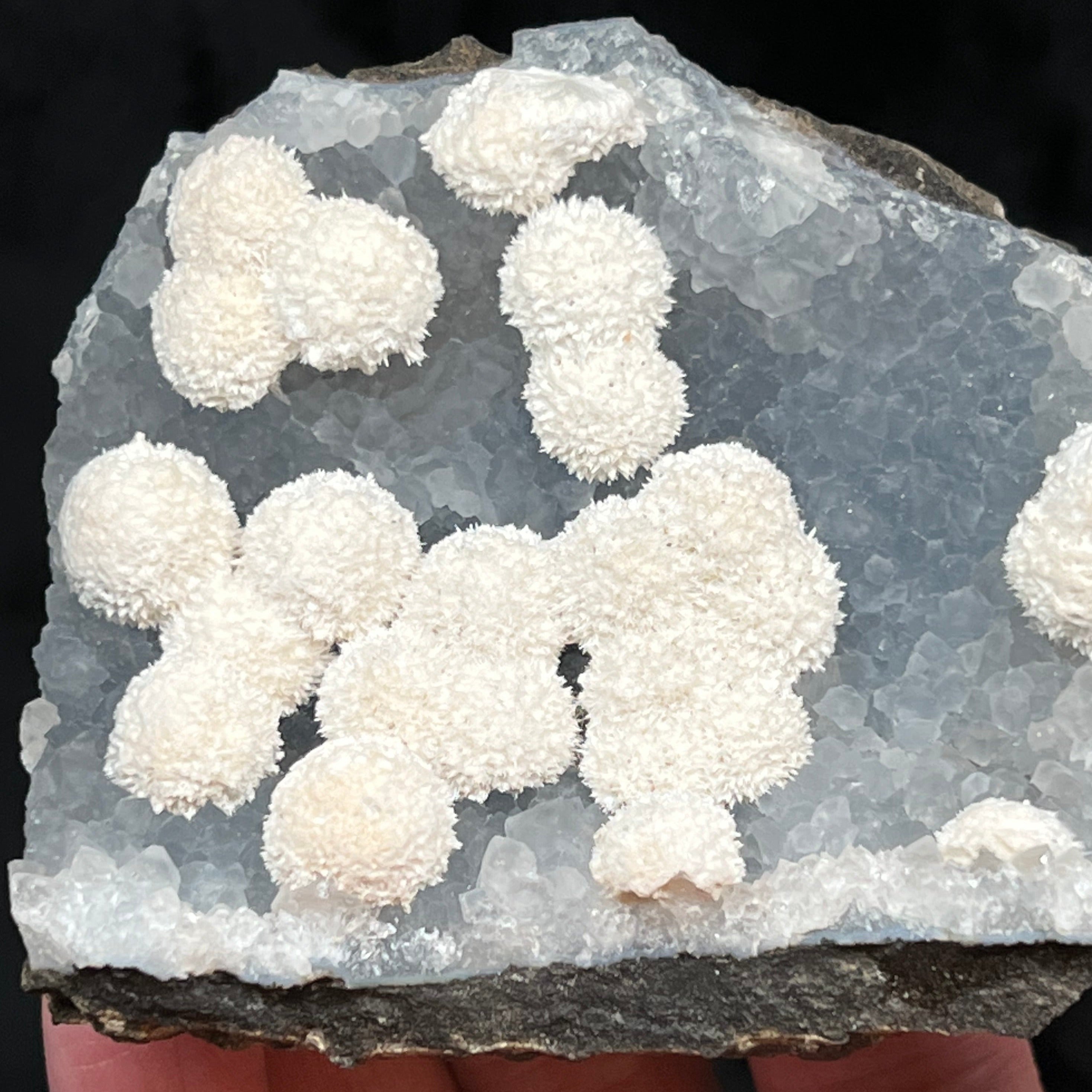 The blue-gray Quartz provides a beautifully contrasting backdrop for the excellent Mordenite in this specimen.