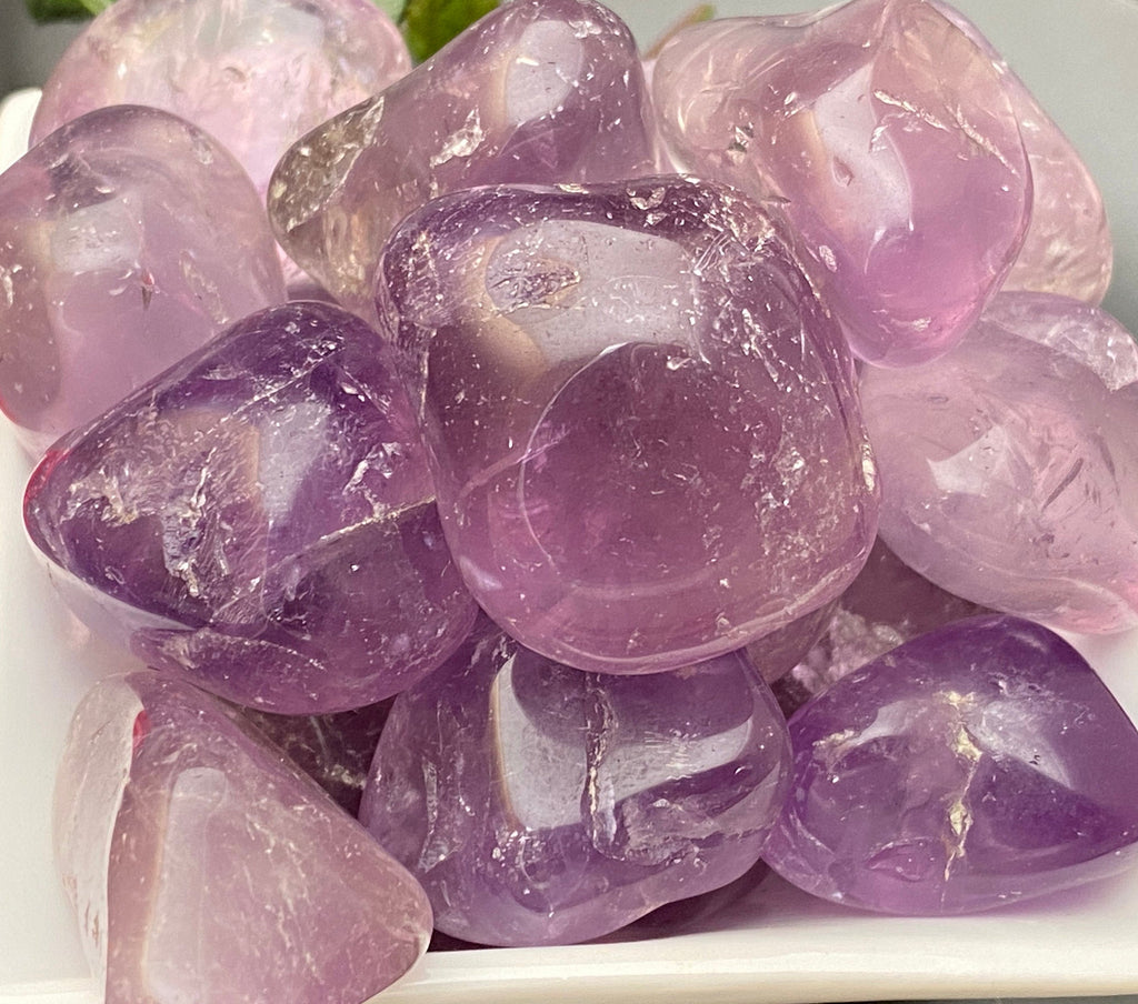 Amethyst tumbled stones medium to large in size.