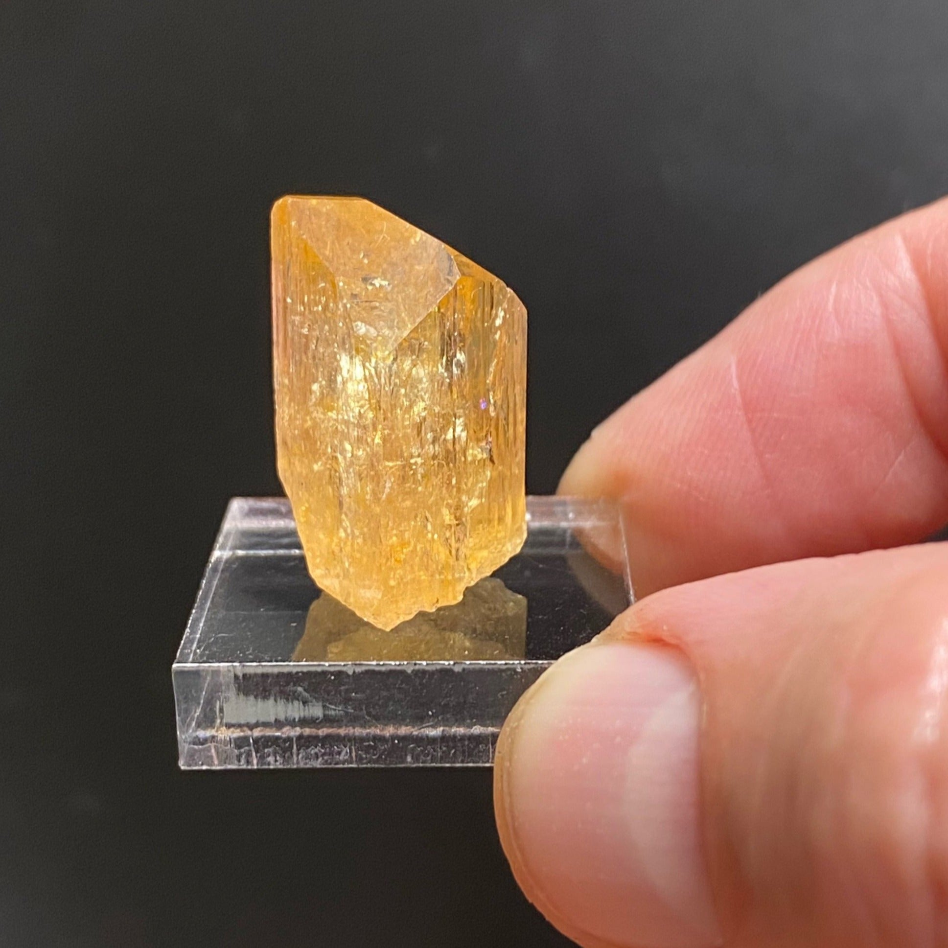 Topaz var. Imperial. The source for this fine Topaz is the Solwezi District, North-Western Province, Zambia. 100% natural. High quality, rare specimen. 8 grams.