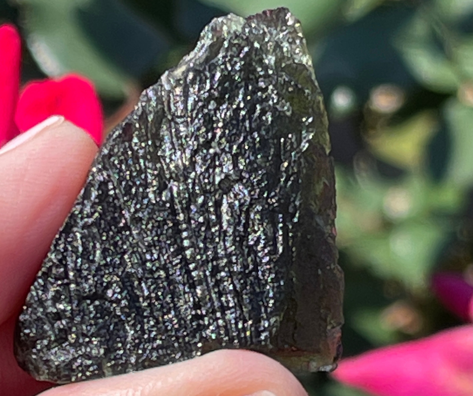 Chlum Moldavite is a rare Tektite, dark green in color.