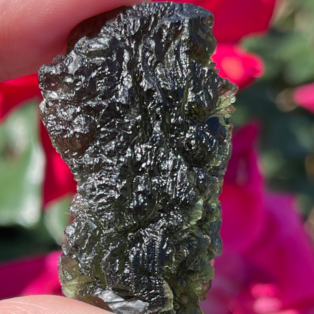 Moldavite is rare and unique Tektite, green and wavy pattern.