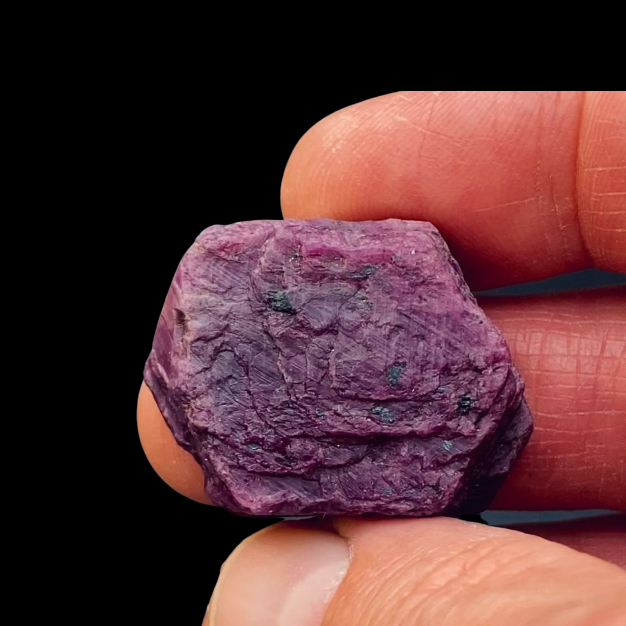 Ruby Crystal shown in hand