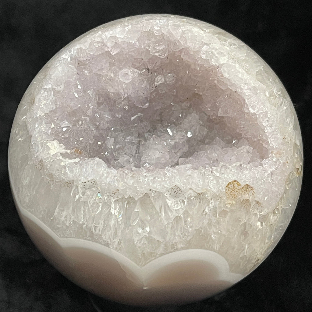Crystal Sphere with pocket of Crystals