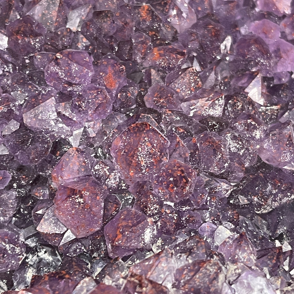 Here is a fascinating close up view of one of the areas on this Hematite included Amethyst from the Panorama Mine, Thunder Bay District, Ontario, Canada..