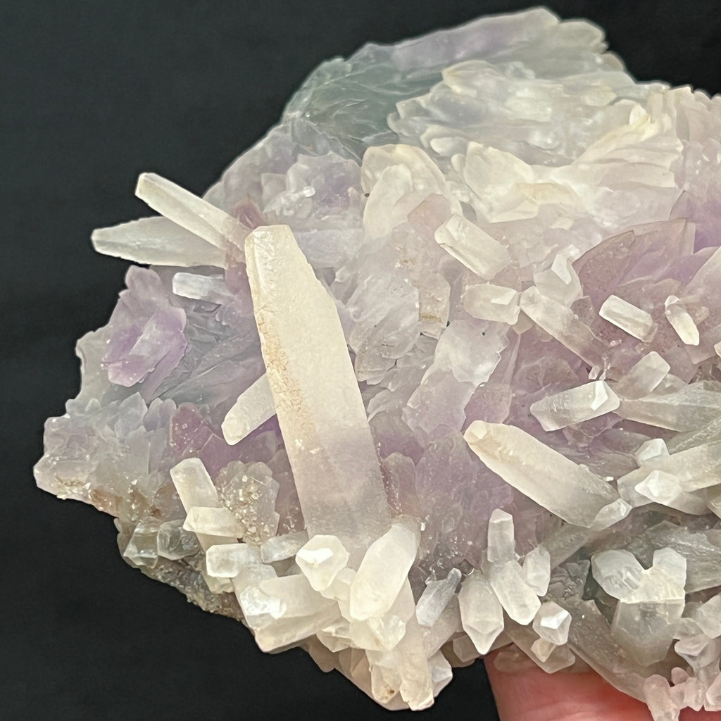 The Calcite exhibits wonderful pointed pyramidal, and flattened pyramidal terminations in this Amethyst Flower specimen.