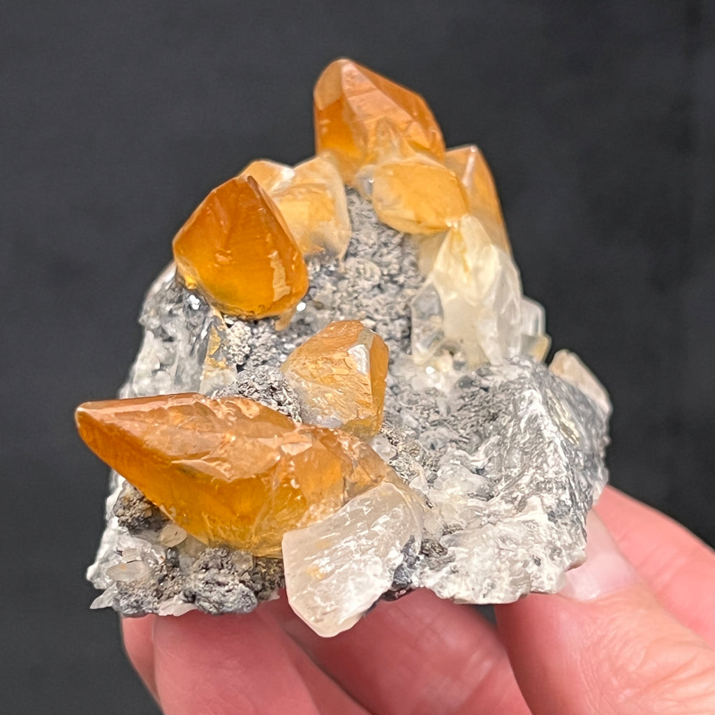 Given the scarcity of this mineral from this locality, this red-orange, hematite included Calcite from the San Giovanni Mine in Italy is certainly one to include in your collection or to gift as a gift. 