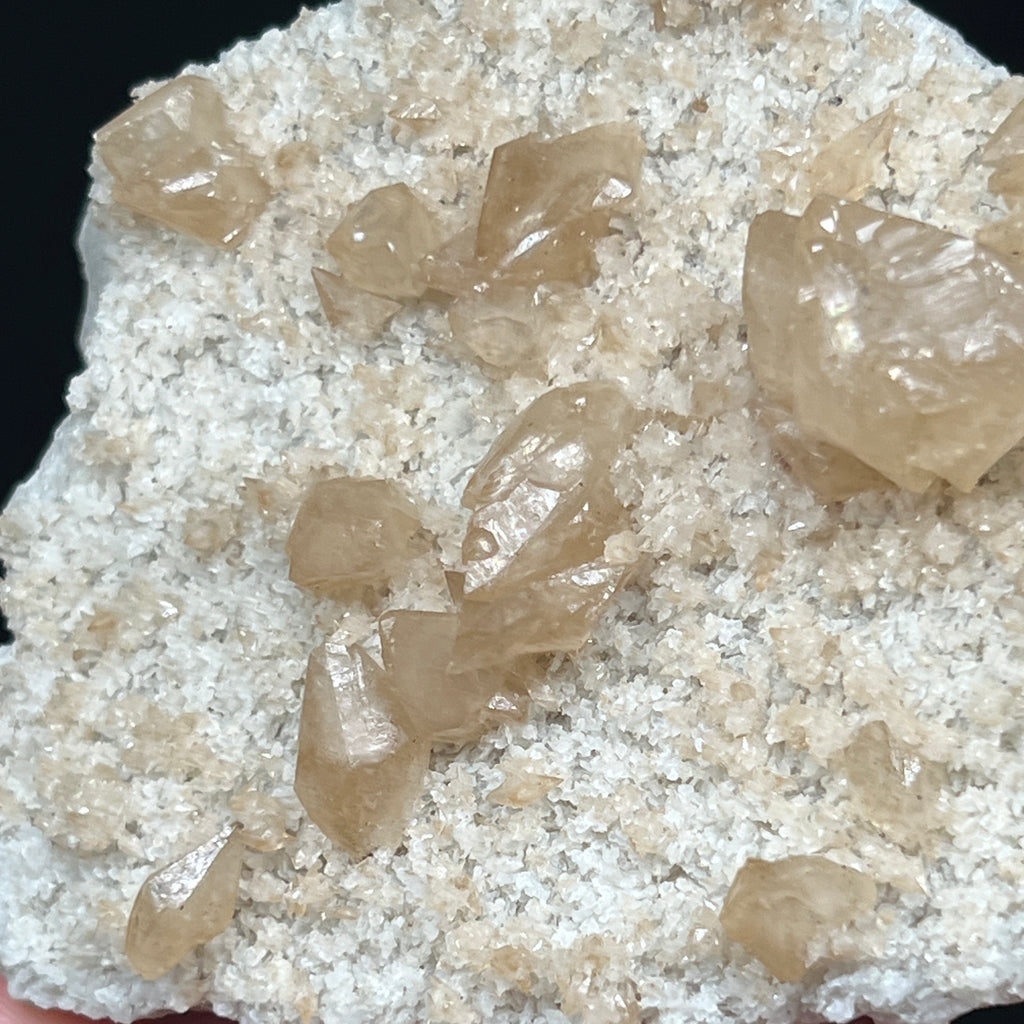 Many of the crystals on this excellent plate of Calcite and Barite are twinned and or present double terminated.