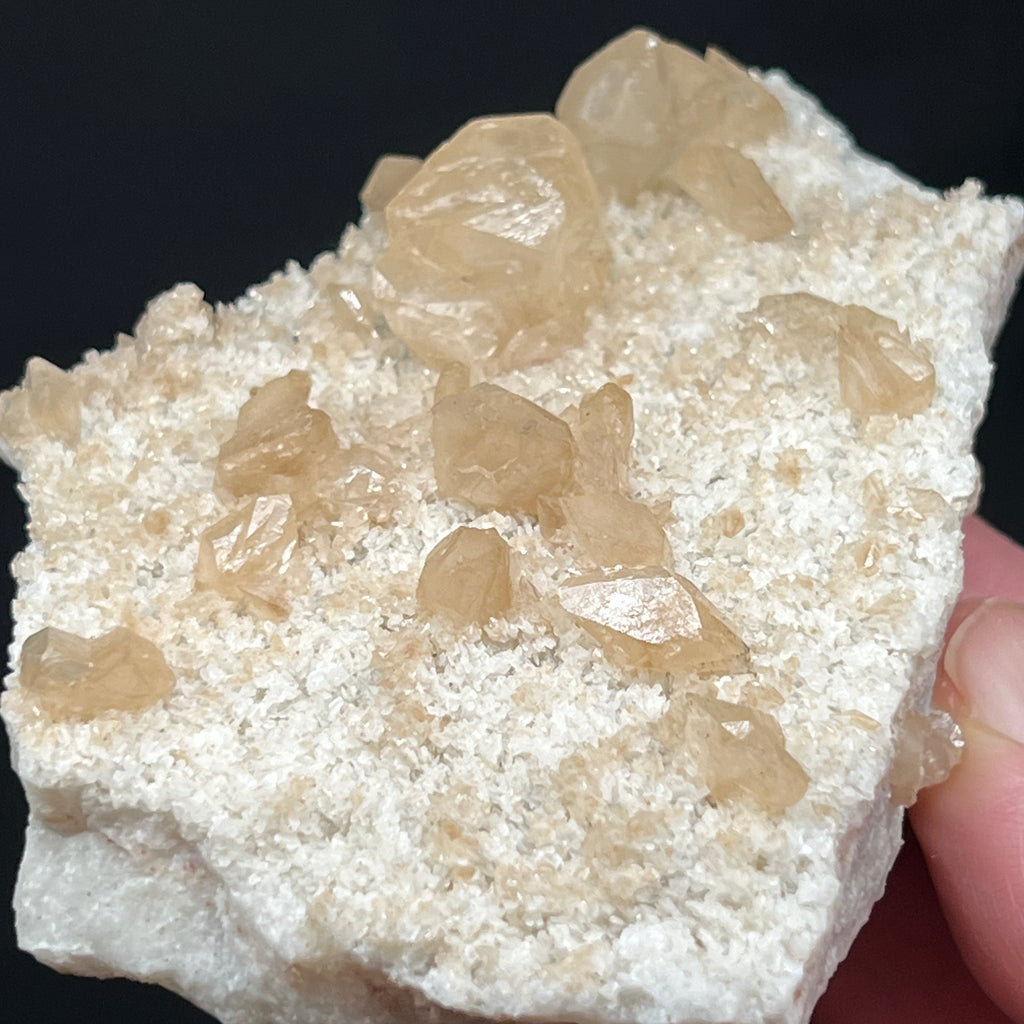 When you're looking for the perfect gift for a mineral collector, this plate of Calcite twinned crystals growing on a bed of Barite is definitely one to give.