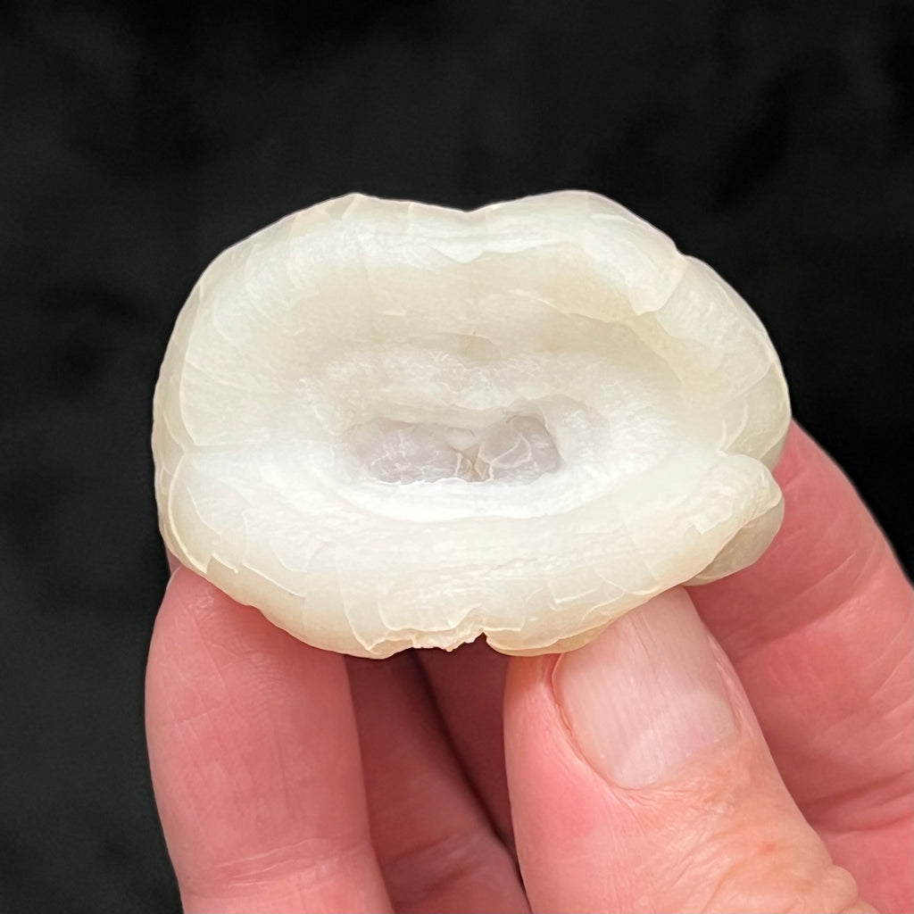 This is a a Quartz var. Chalcedony formation referred to as a Chalcedony Cup with an uncanny, all natural, beautiful mouth shape, and featuring a smooth, rounded lip like structure.