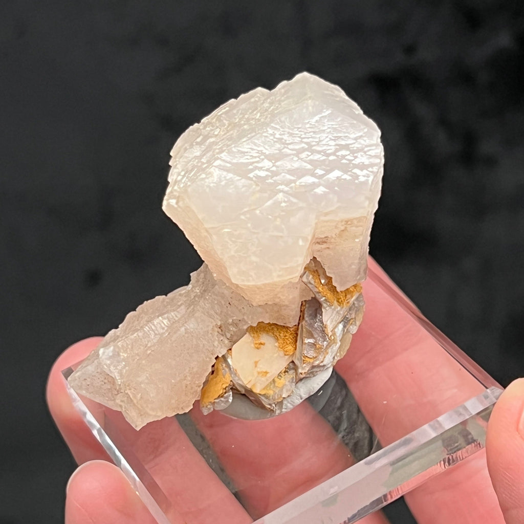 Interesting, stepped-like growth is evident on the faces and facets of the Calcite crystals for a cool textured appearance. The source for this fine, unusual Calcite is the Vtoroy Sovetskiy Mine, Dalnegorsk, Russia.