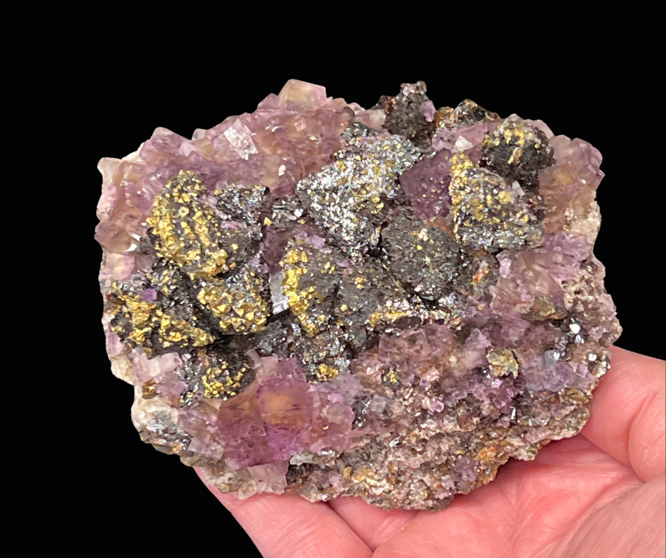 Fluorite, Pyrite, Sphalerite shown in hand