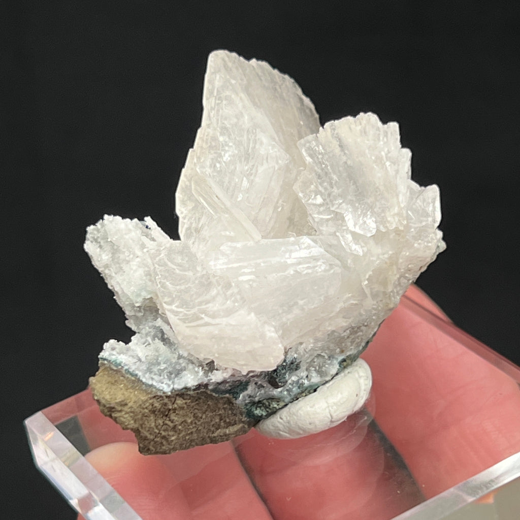 This is a beautiful, well formed Heulandite cluster of crystals exhibiting the characteristic wedge structure and excellent luster, pearly and vitreous.  From the Pune District, Pune Division, Maharashtra, India.