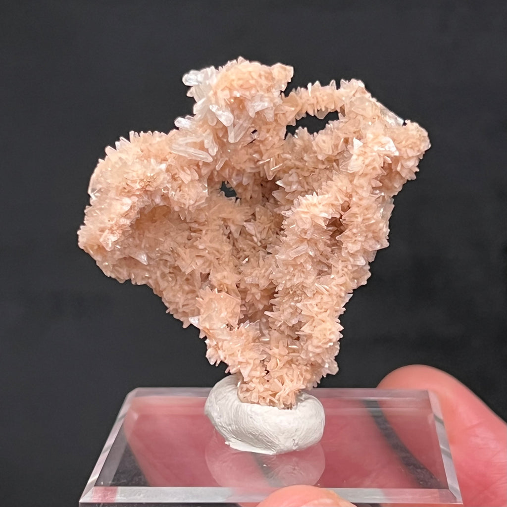 This is an exceptional, truly rare, translucent to transparent, pale to light salmon pink Heulandite with white, some colorless Stilbite and minor Chalcedony Stalactite formation from an old collection. 