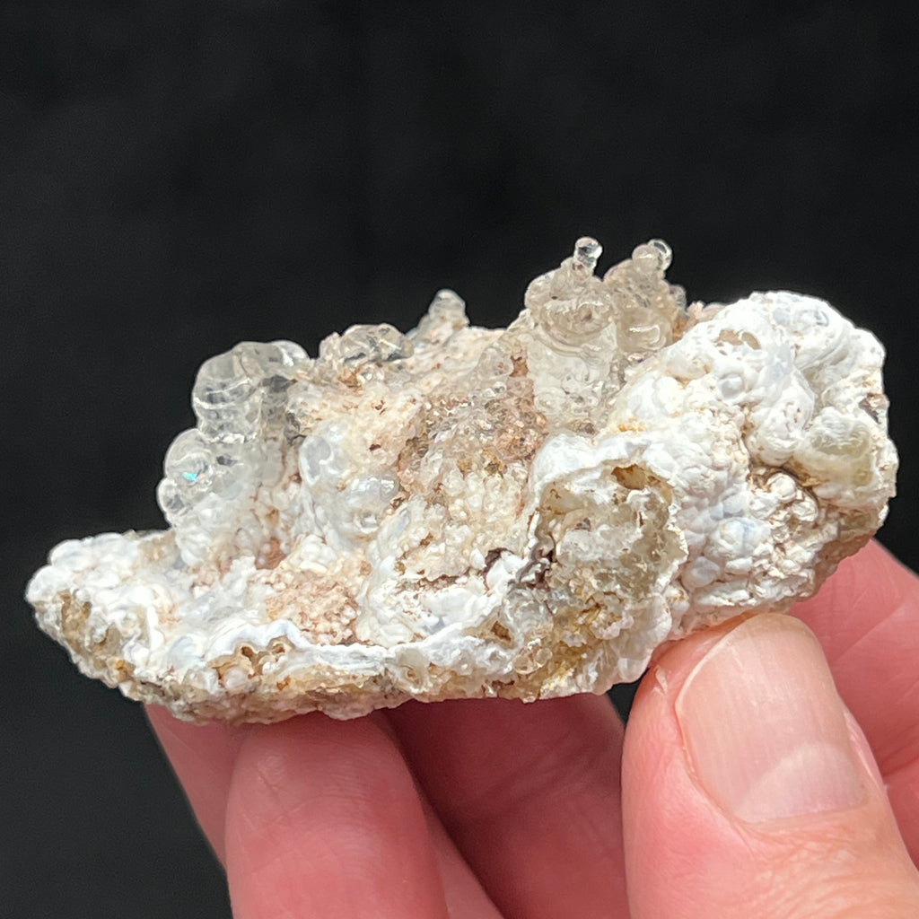 This is a 100% natural, high quality, translucent to transparent Opal variety Hyalite, a.k.a. Hyalite Opal, with a beautiful glassy, botryoidal habit that includes solidified, fascinating, bubbly, unusual pointed looking structures.