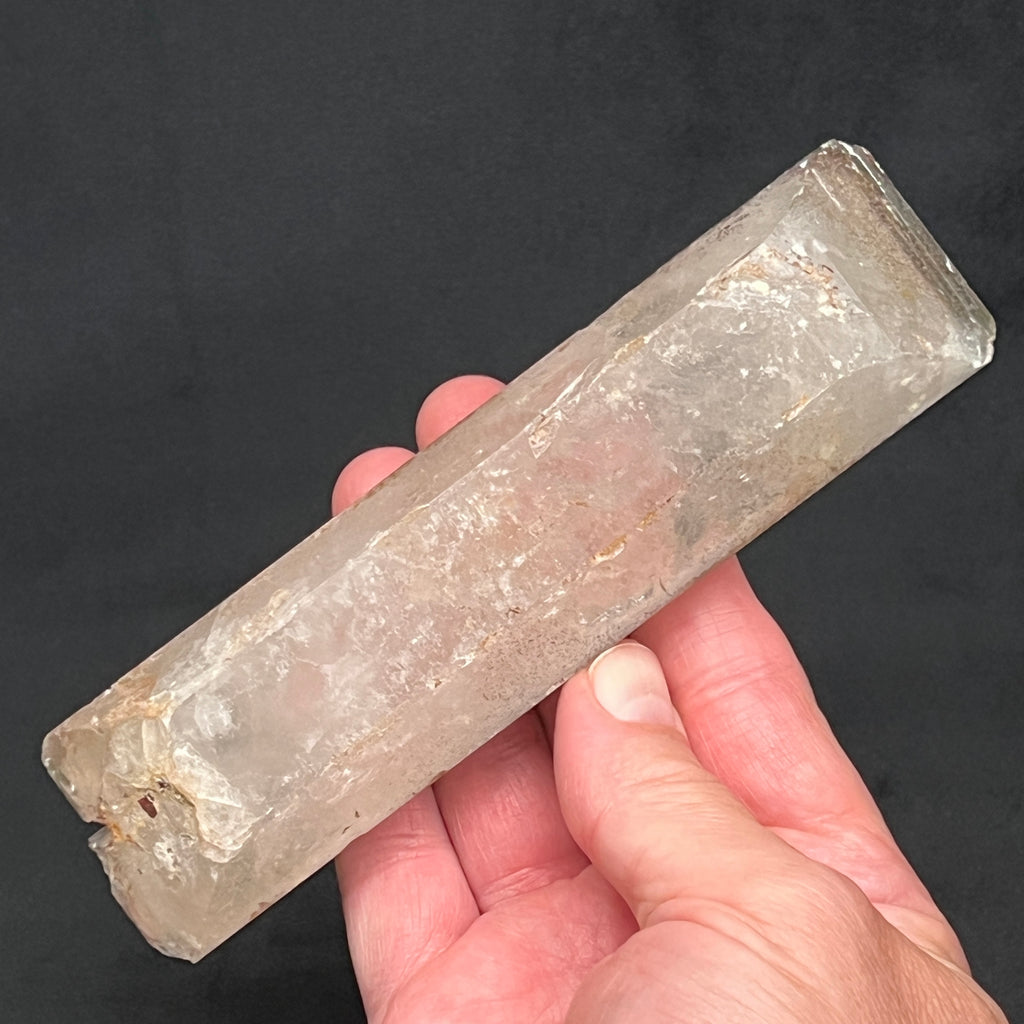 Though some the edges present with rough, scuffed, bruised edges, faces and contact area, and iron oxide, given the scarcity of a Barite crystal this large, it is truly a fascinating rarity.