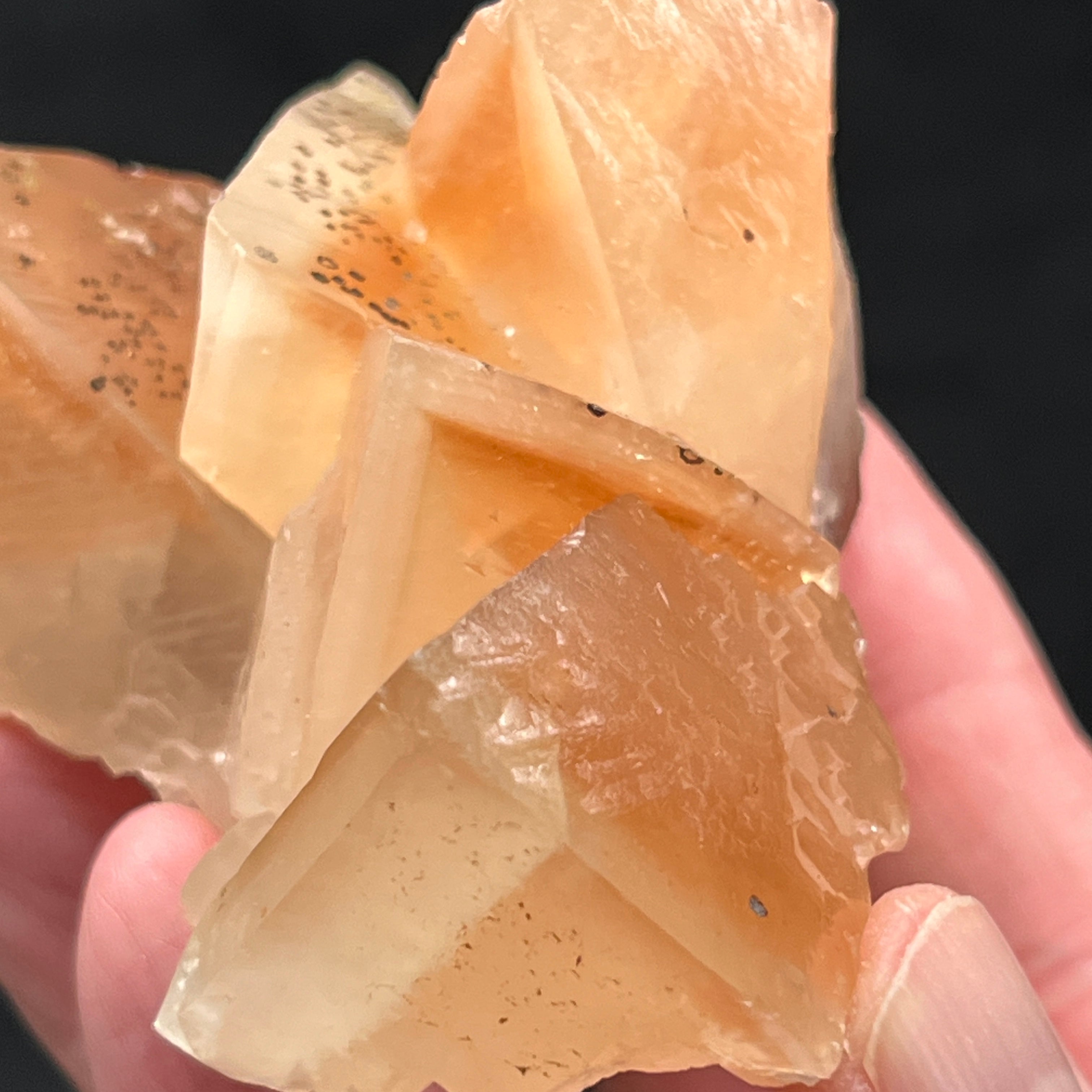 Here is another view of the outstanding color of these Calcite crystals and the fascinating phantoms within them.
