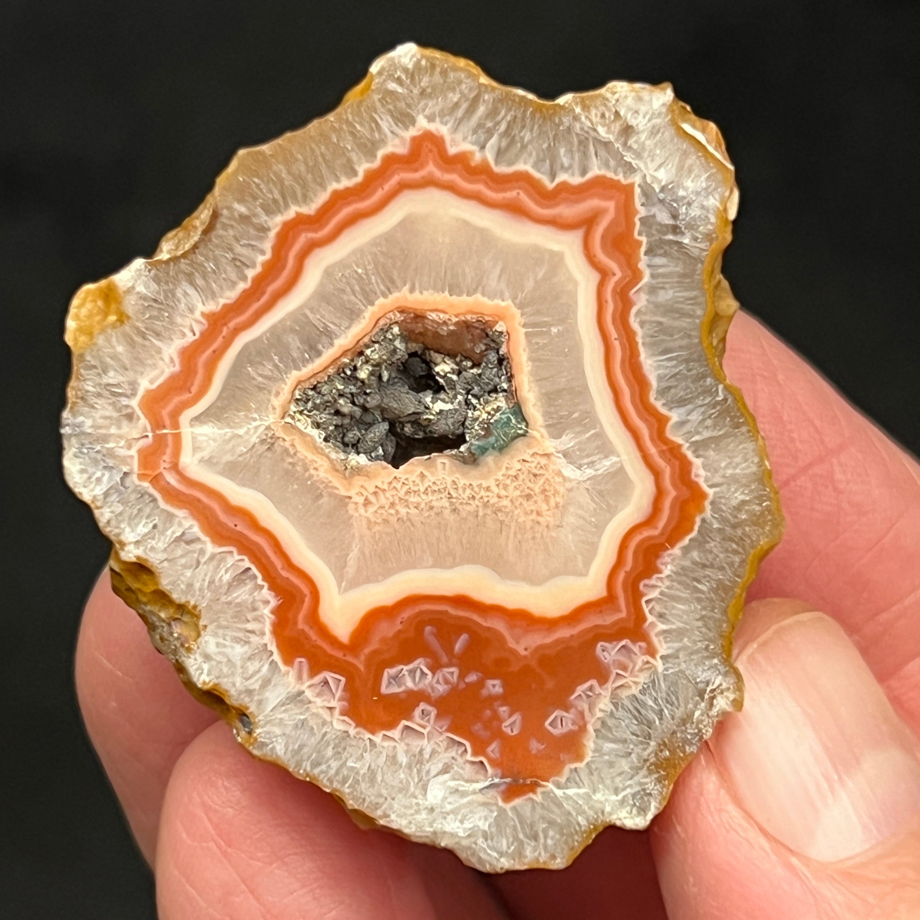 Exhibits beautiful banding and fortification with a cool radiating structure of the quartz var. chalcedony.