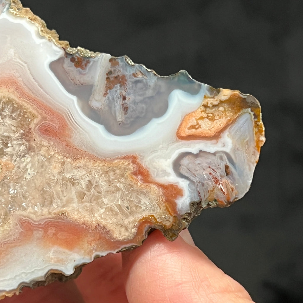 Here is another close look at one end of this excellent agate from Morocco that includes the appearance of rarer pseudomorph agate, or stick agate on both ends of the piece.