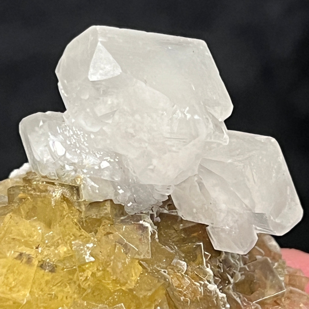 The Calcite crystals present beautifully on the gorgeous yellow, excellently transparent Fluorite in this piece.