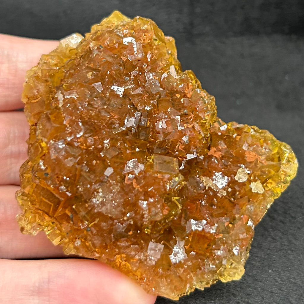 This is a rich honey color, higher quality example of Fluorite and Chalcopyrite with well formed yellow, cubic Fluorite on both sides of the specimen.