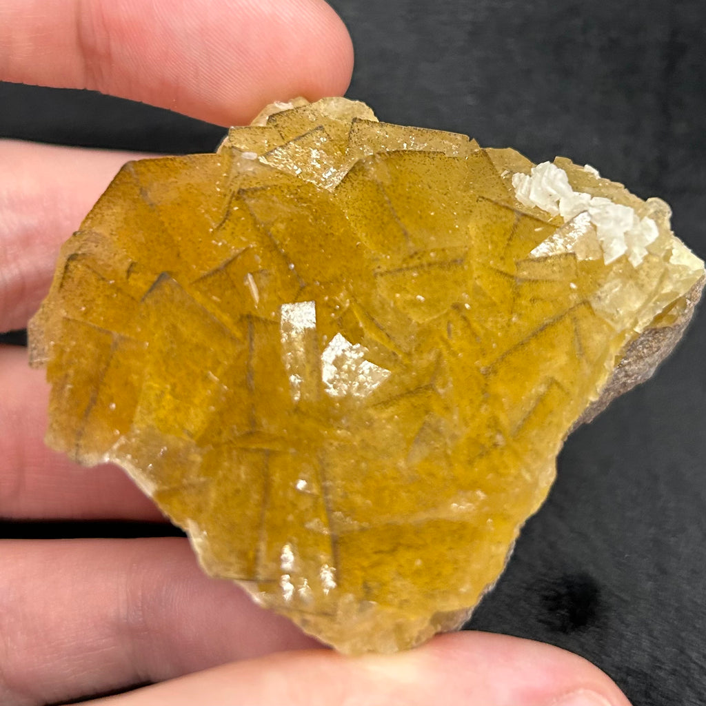 This is a higher quality example of Fluorite, Dolomite and Chalcopyrite with well formed yellow, cubic Fluorite on one side of the specimen.