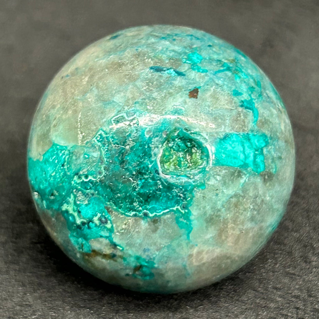 This sphere has a natural formed dimple.
