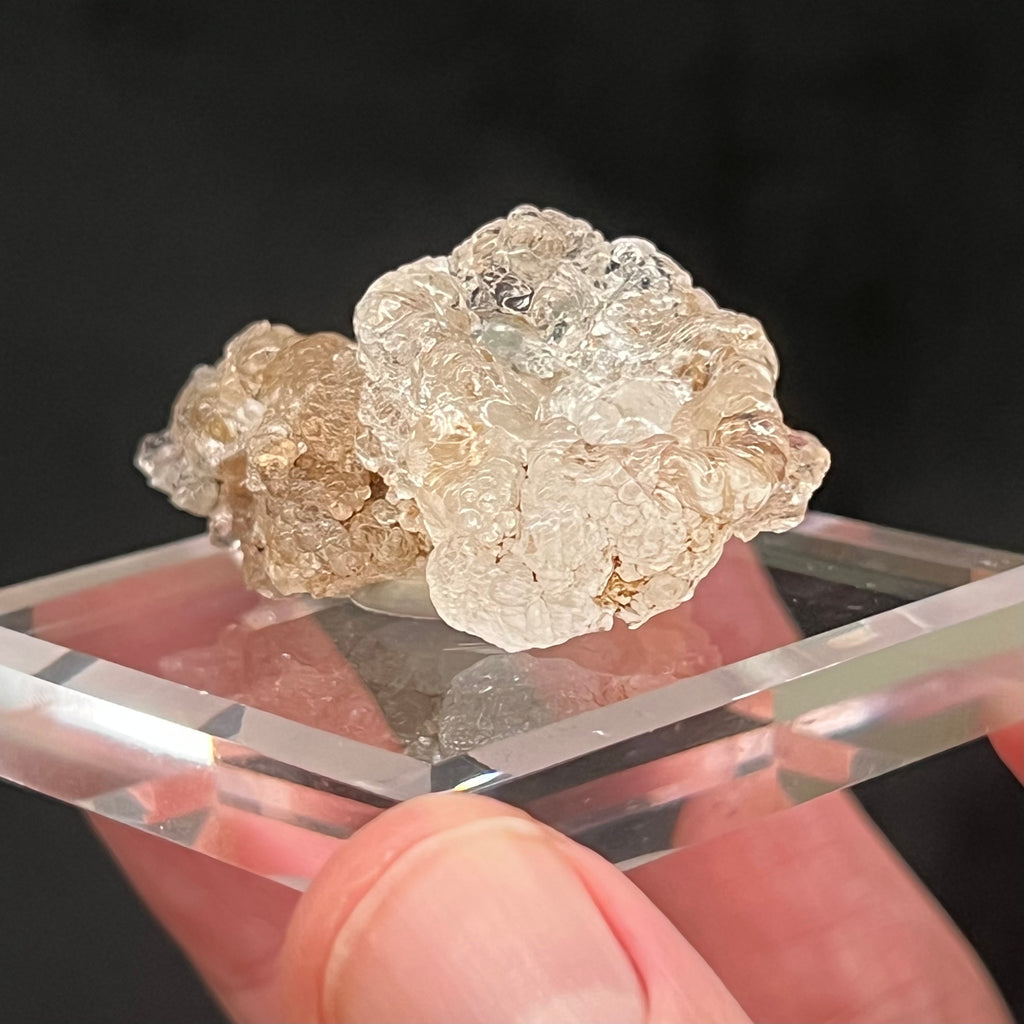 This is a 100% natural, high quality, captivating, translucent to transparent Opal variety Hyalite, a.k.a. Hyalite Opal, with exceptional glassy, bubbly botryoidal habit that solidified into a fascinating bowl shape formation and fluoresces with a bright green glow when exposed to UV light. 