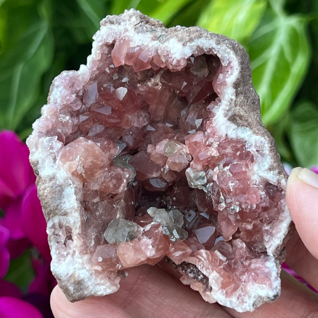This is a high quality dark Pink Amethyst and Calcite crystals geode exhibiting excellent color. 