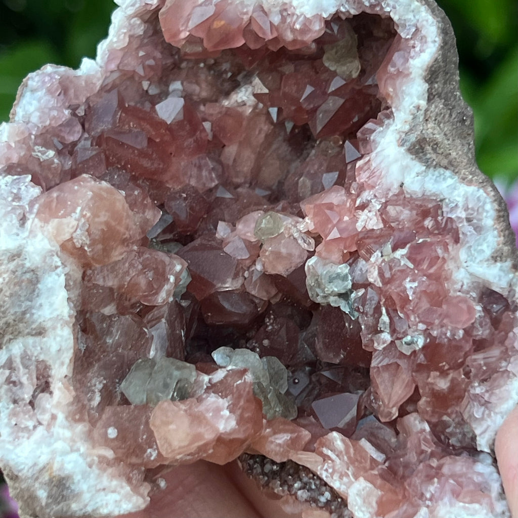 The Calcite crystals in this fine Pink Amethyst Crystals Geode are reactive, fluorescing orange-pink and bright white when exposed to UV light. 