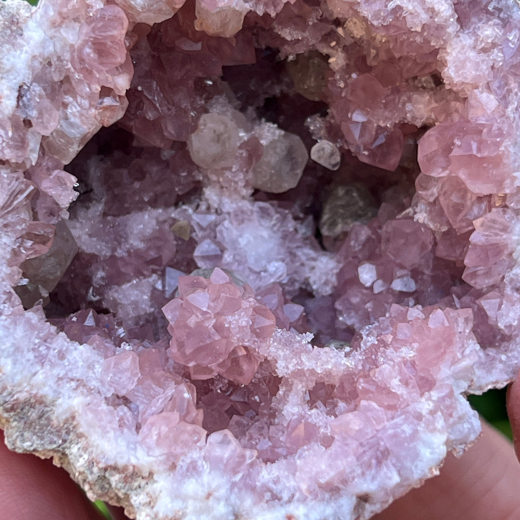 Shown in this group of photos are both sides of a superb whole Pink Amethyst geode exhibiting beautiful color, flower-like rosette formations and drusy bridge formations, including well formed UV reactive Calcite crystals.