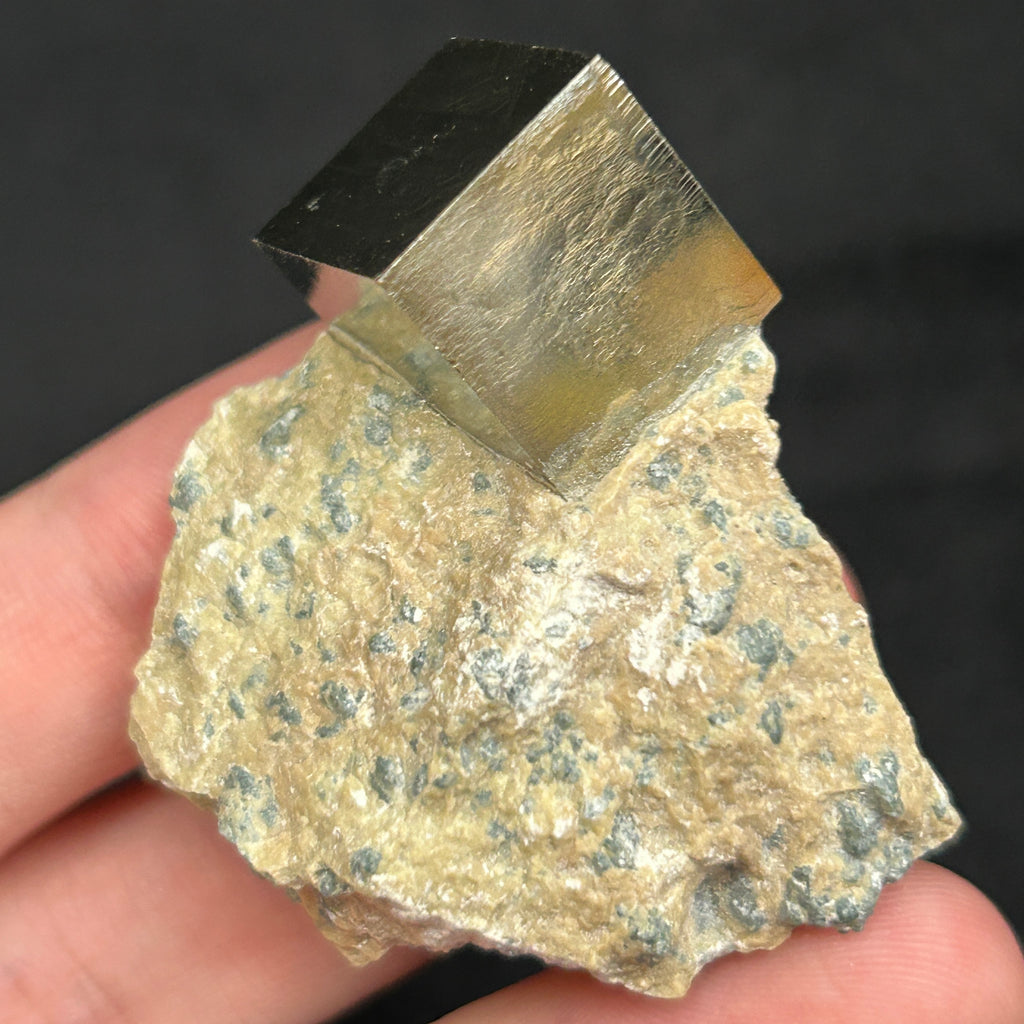 Exhibited is a well formed, beautiful higher quality** crystal specimen with attractive mirror-like metallic luster and fascinating growth patterns on faces. 48 grams.