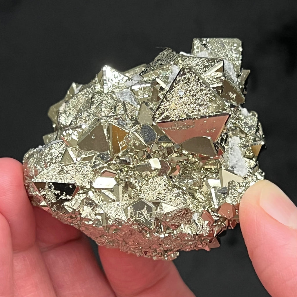 The faces of these crystals are very brightly reflective. The source for this exceptional, extremely bright octahedral Pyrite crystals cluster is the Huanzala Mine, Huallanca, Bolognesi Province, Ancash, Peru.
